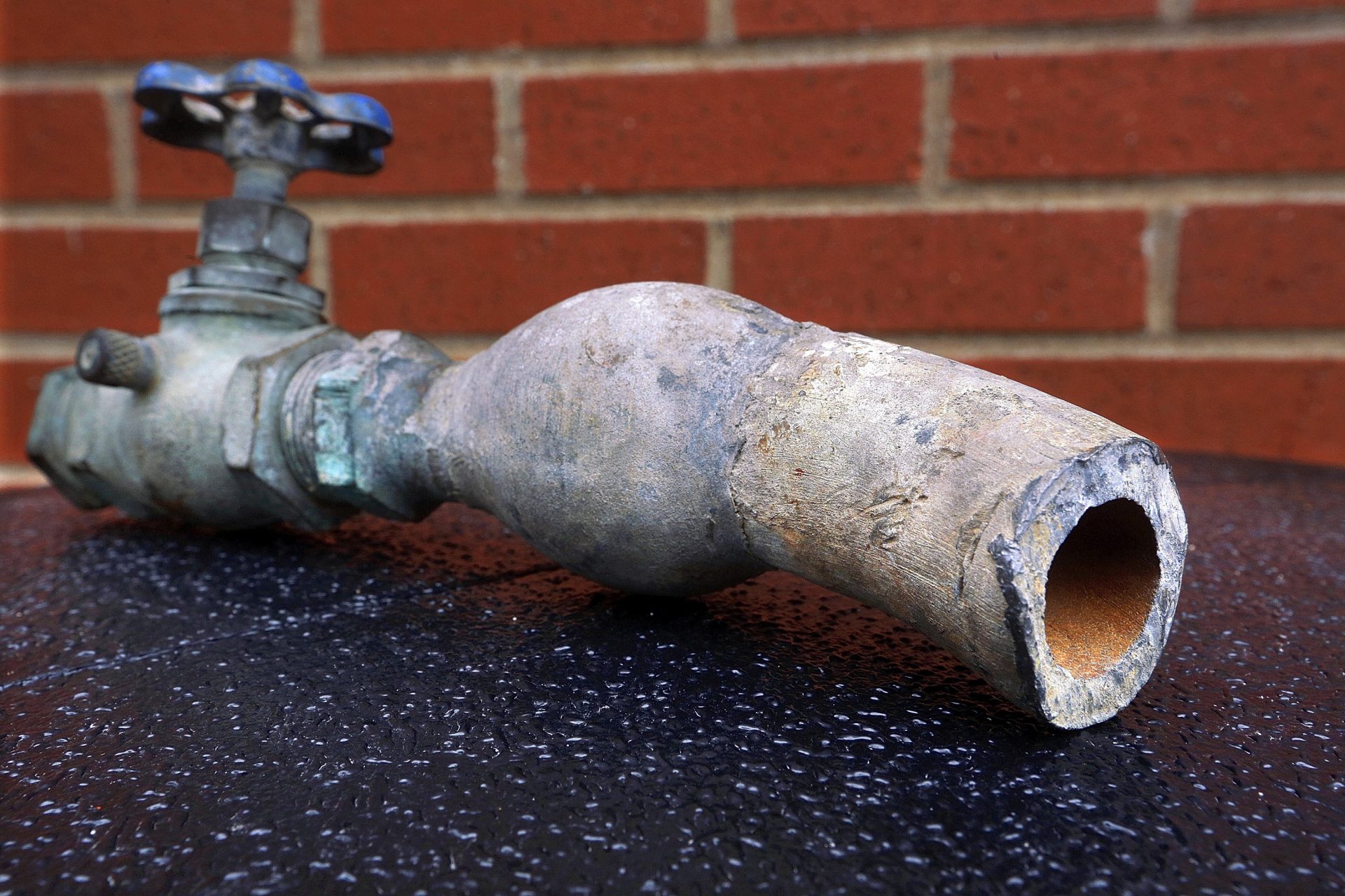 In this March 9, 2016 photo, an example of lead pipes that deliver water to the nation's homes is on display.