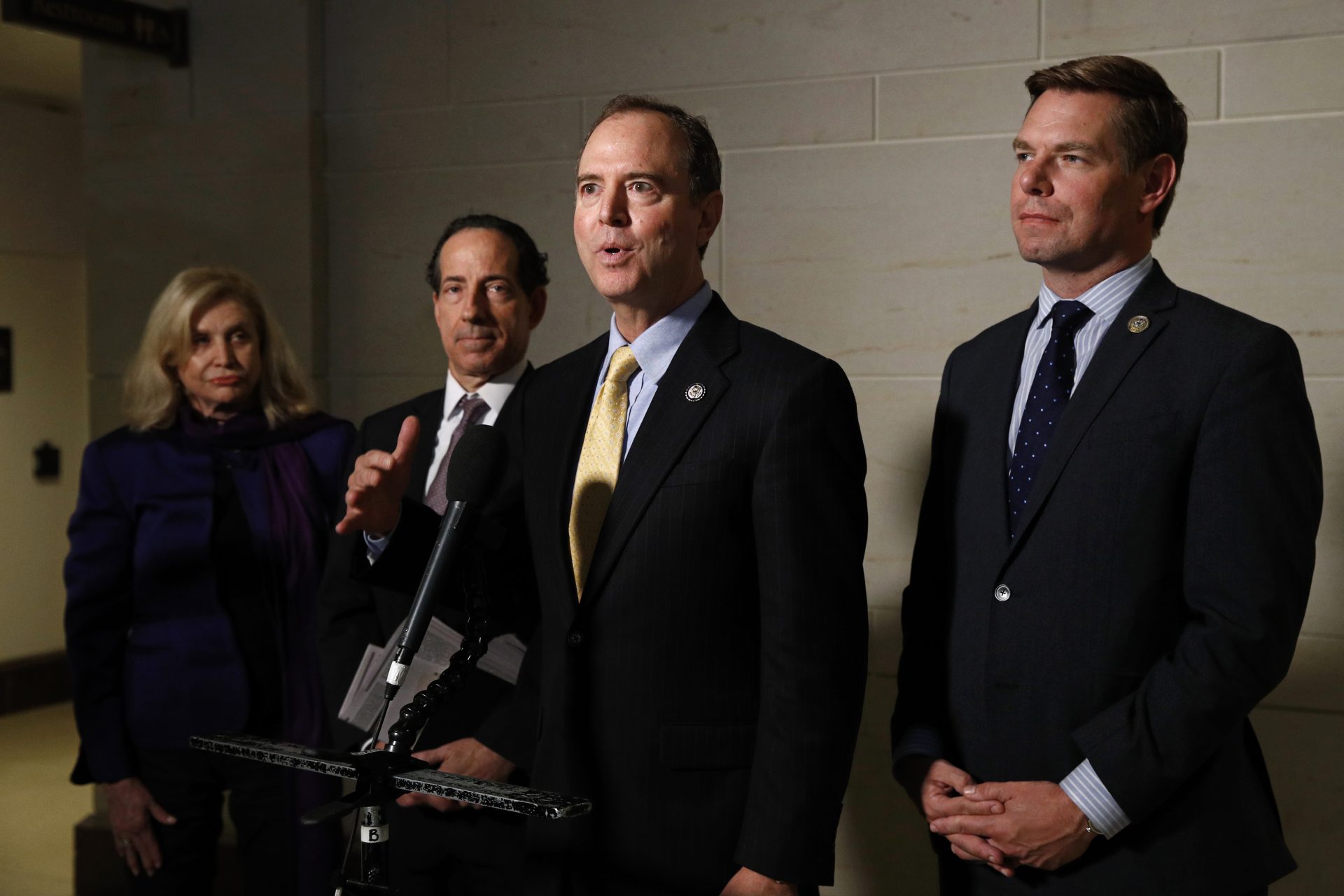 Rep. Adam Schiff, D-Calif., center, speaks with members of the media after former deputy national security adviser Charles Kupperman signaled that he would not appear as scheduled for a closed door meeting to testify as part of the House impeachment inquiry into President Donald Trump, Monday, Oct. 28, 2019, on Capitol Hill in Washington. Standing with Schiff are Carolyn Maloney, D-N.Y., from left, Rep. Jamie Raskin, D-Md., and Rep. Eric Swalwell, D-Calif.