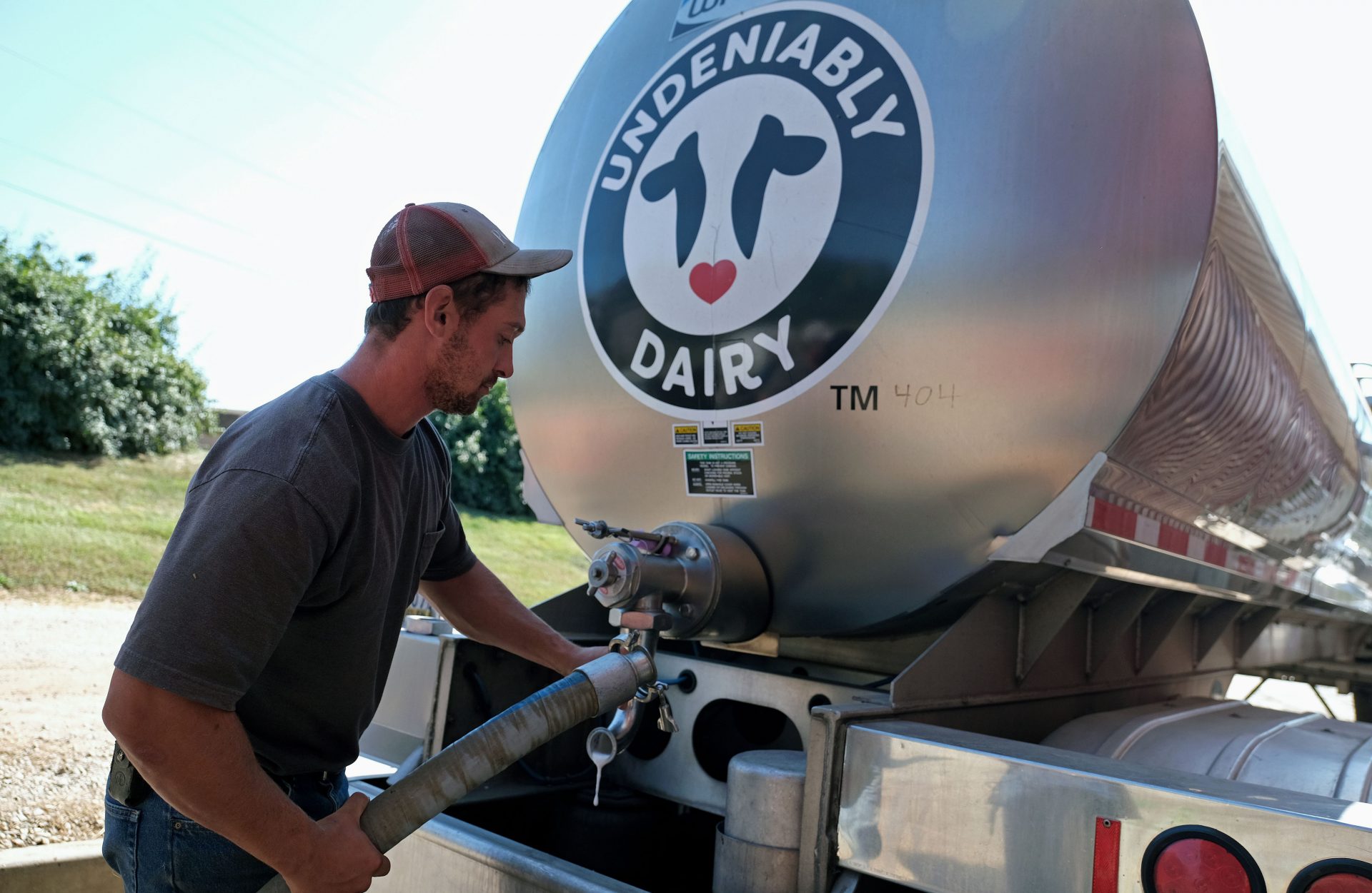 Brian Kuntzman, of Pottstown, works on filling a tanker truck with milk for delivery Sept. 25, 2019, at Ar-Joy Farms in West Fallowfield Township, Pennsylvania.