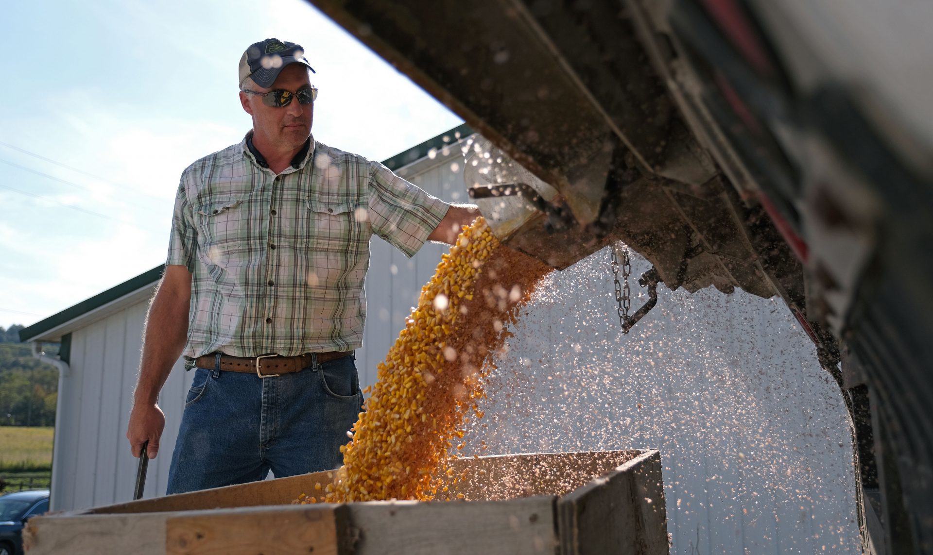 Grain farmer Mike Braucher works on unloading harvested corn Sept. 27, 2019, at Braucher Farms in Centre Township, Pennsylvania.