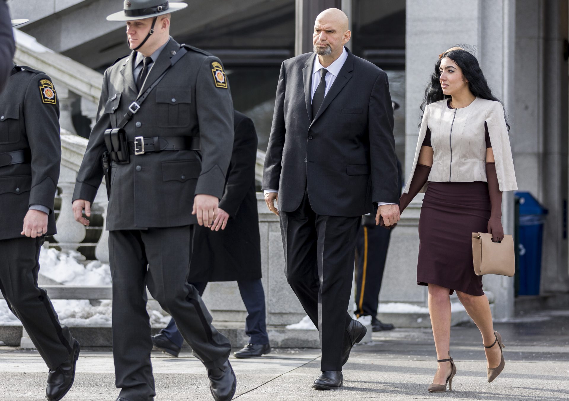 Pa. Lt. Gov. John Fetterman and his wife Gisele make their way to the stage before the inauguration of Pa. Gov. Tom Wolf held outside the Capitol East Wing on Jan. 15, 2019.