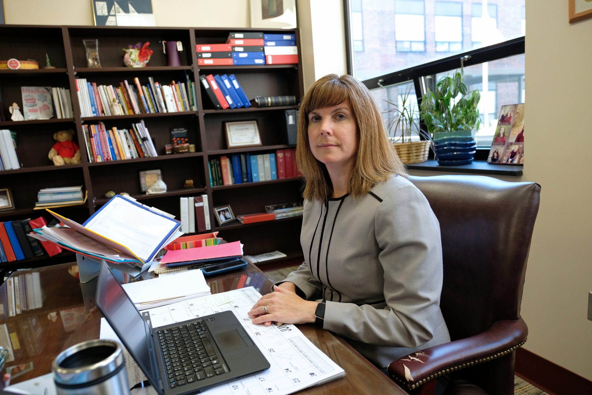 Saint Clair School District Superintendent Sarah Yoder poses while in her office June 11, 2019, during an interview about parents in her district using cyber charter schools as a way to avoid truancy issues. Yoder also spoke of the roles schools play in providing a daily welfare check on students with troubled or volatile home situations.