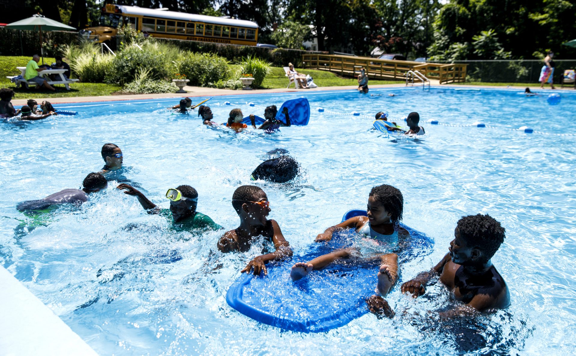 Students from Harrisburg's Rowland Academy swim in the pool. The swimming pool at the lieutentant governor's residence at Fort Indiantown Gap is open to groups in a program being overseen by Gisele Fetterman, second lady of Pennsylvania, to teach water safety and offer exposure to swimming. July 24, 2019. 