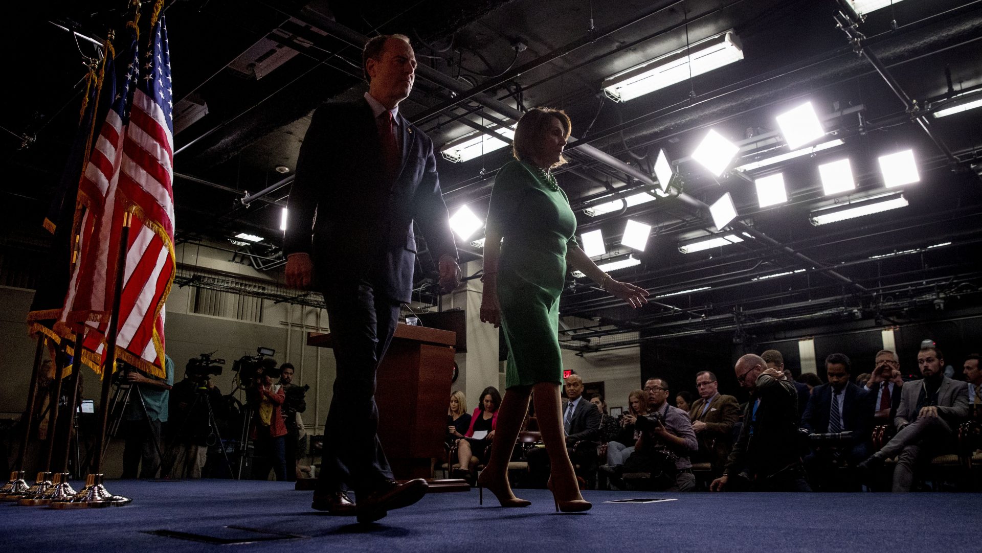 Rep. Adam Schiff, D-Calif., chairman of the House Intelligence Committee, left, and House Speaker Nancy Pelosi of Calif., right, leave after speaking about the House impeachment inquiry into President Trump on Capitol Hill Tuesday.