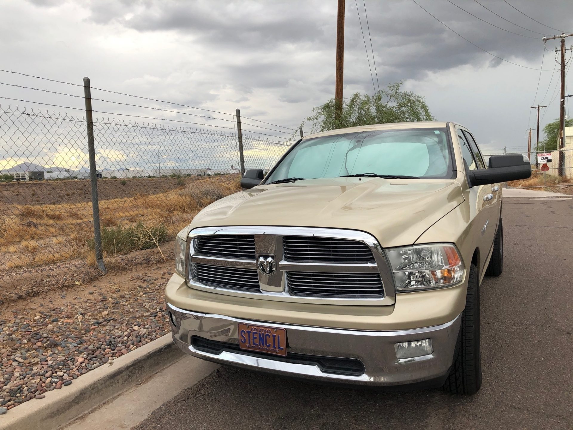 The vehicle of former priest Steven Stencil, left, is parked outside a bus company in Phoenix, Ariz., on Thursday, Sept. 26, 2019. In 2001, Stencil was suspended from ministry after a trip to Mexico that violated a Diocese of Tucson policy forbidding clerics from being with minors overnight. Since 2003, his name has appeared on the diocese's list of clerics credibly accused of sexually abusing children, and his request to leave the priesthood was granted in 2011. In a 2019 Facebook post, the former priest said that he was working as a driver for this private bus company that specializes in educational tours for school groups and scout troops.