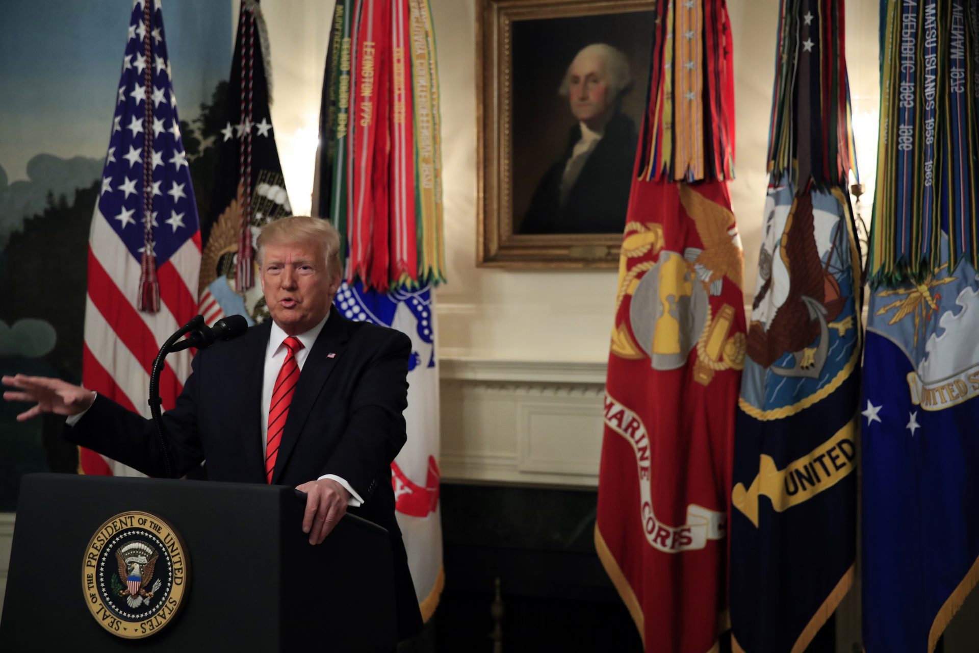 President Donald Trump speaks in the Diplomatic Room of the White House, Sunday, Oct. 27, 2019 in Washington. Trump says Islamic State group leader Abu Bakr al-Baghdadi died after running into a dead-end tunnel and igniting an explosive vest, killing himself and three of his young children,