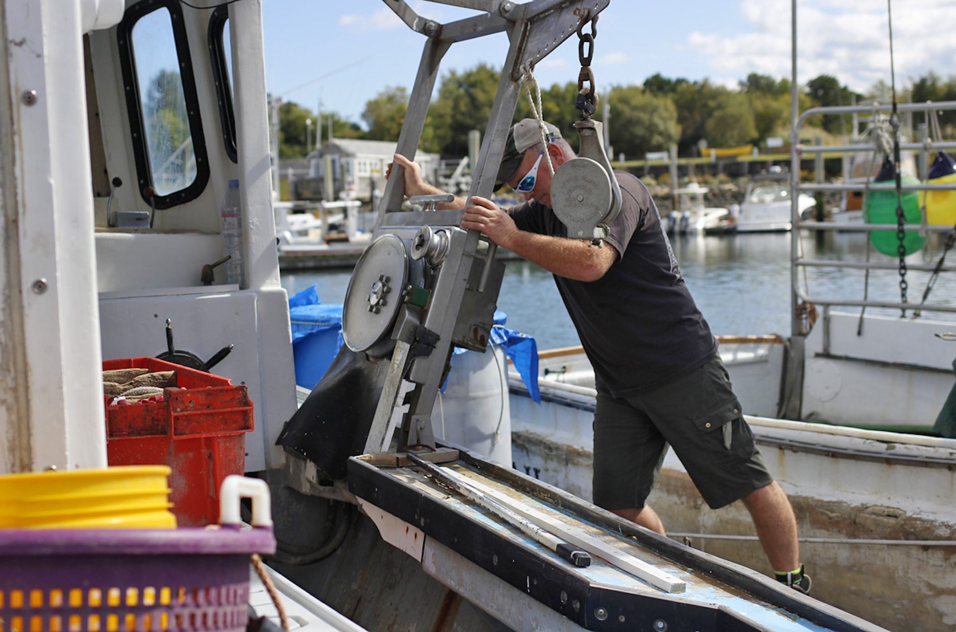 Rob Martin prepares to take his boat out to rescue a sea turtle caught in some fishing line.