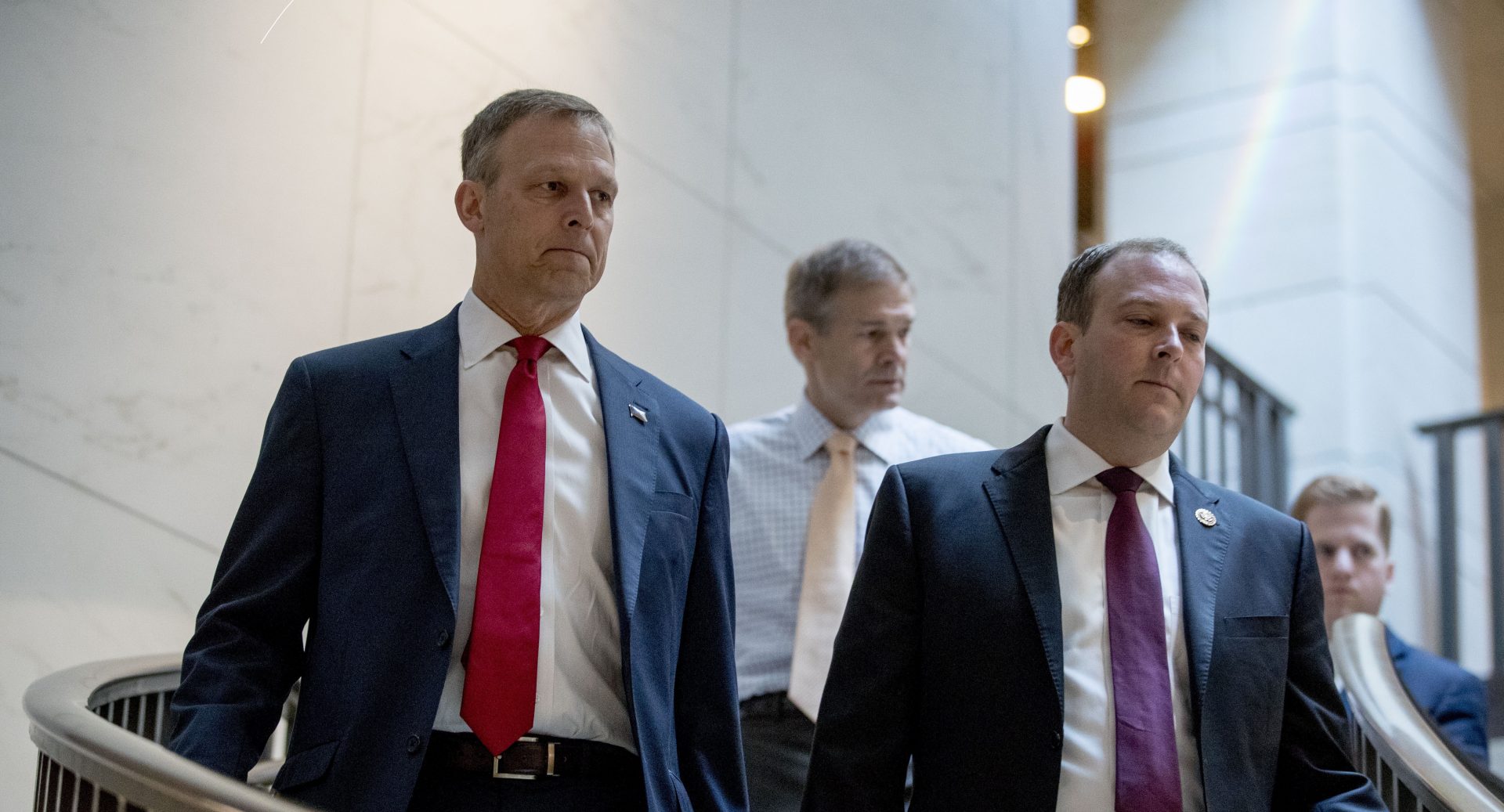 Republican lawmakers, from left, Rep. Scott Perry, R-Pa., Rep. Jim Jordan, R-Ohio, ranking member of the Committee on Oversight Reform, and Rep. Lee Zeldin R-N.Y., arrive for a closed door meeting on Capitol Hill in Washington, Monday, Oct. 14, 2019, where former White House advisor on Russia, Fiona Hill, is scheduled to testify before congressional lawmakers as part of the House impeachment inquiry into President Donald Trump.