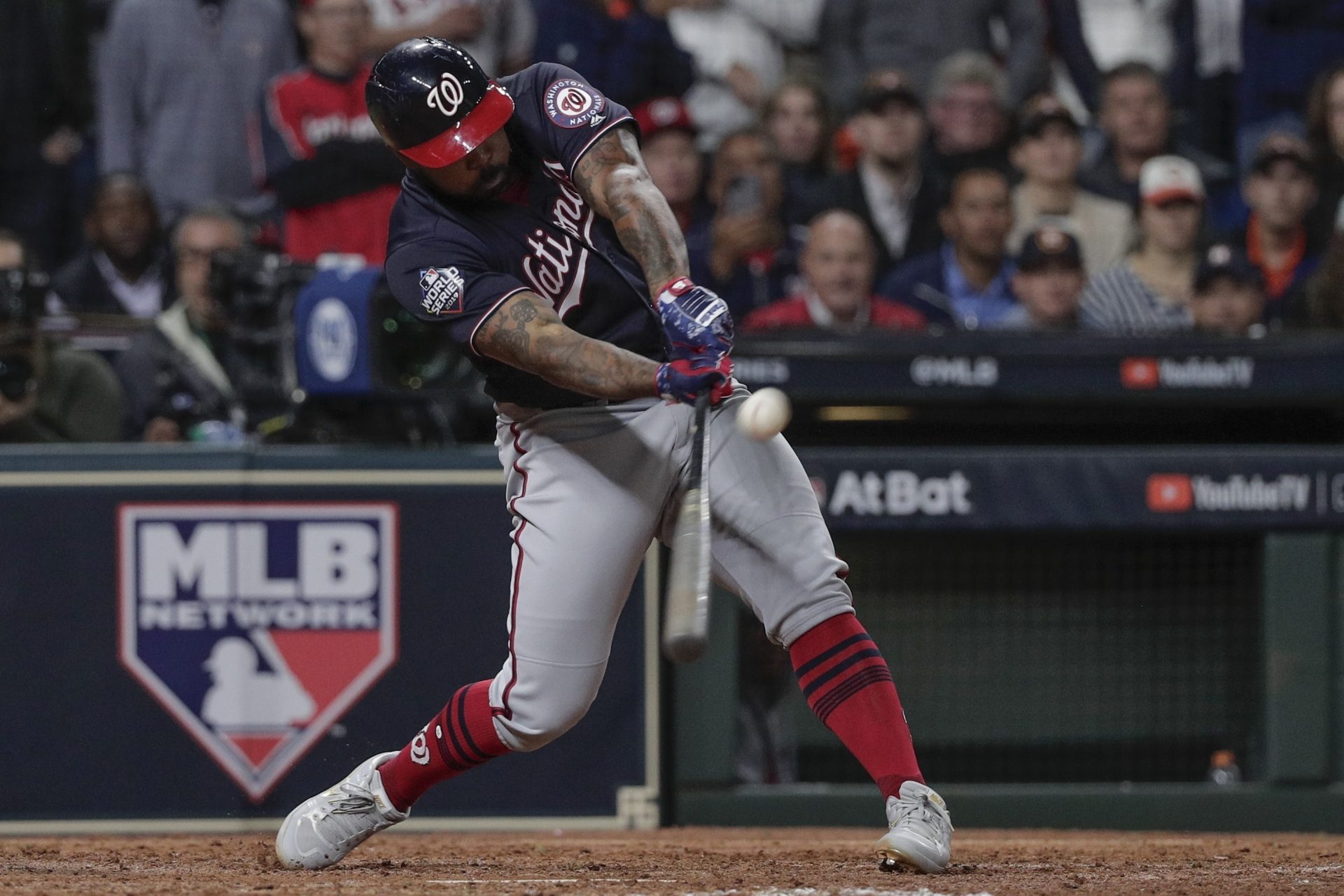 Washington Nationals' Howie Kendrick hits a two-run home run during the seventh inning of Game 7 of the baseball World Series against the Houston Astros Wednesday, Oct. 30, 2019, in Houston.