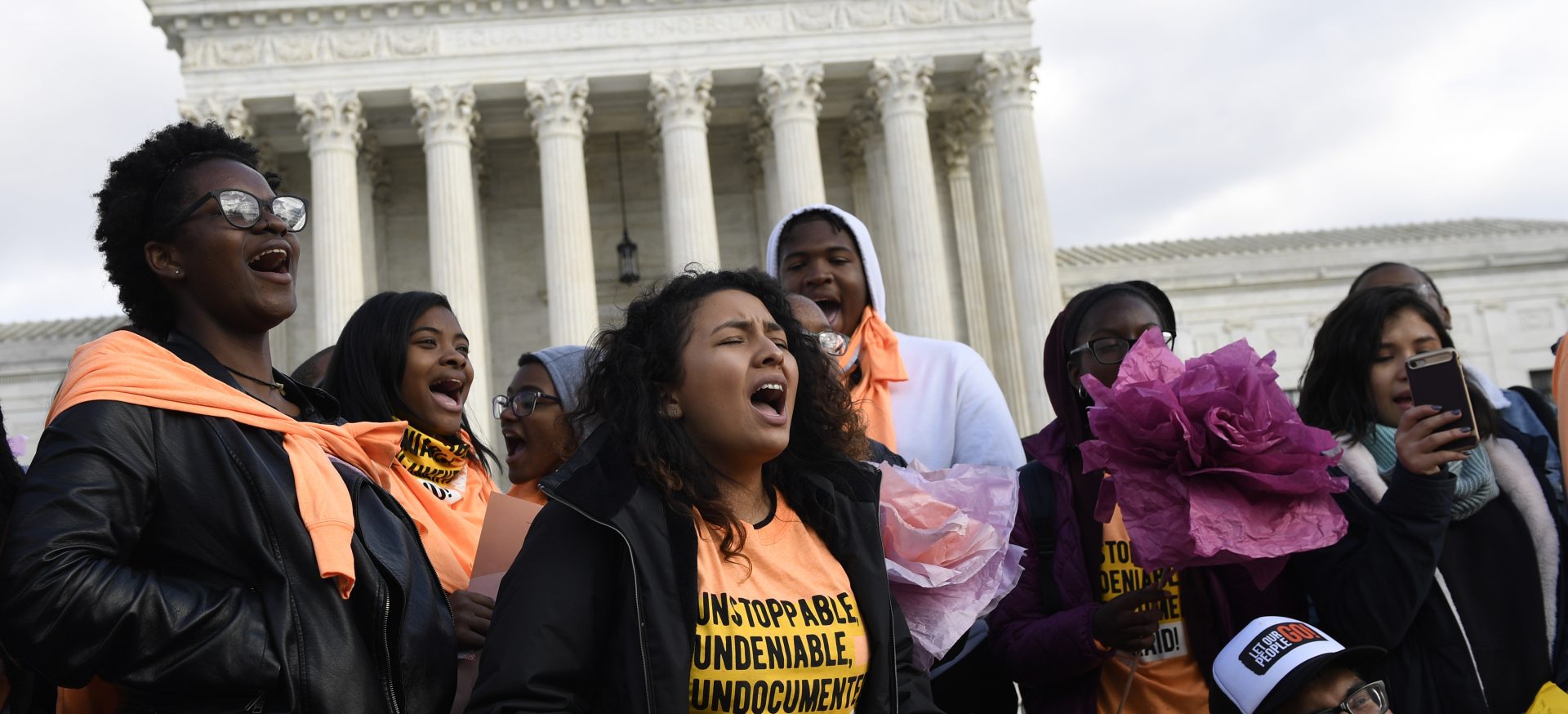 People protest outside the Supreme Court in Washington, Friday, Nov. 8, 2019. The Supreme Court on Tuesday takes up the Trump administration’s plan to end legal protections that shield nearly 700,000 immigrants from deportation, in a case with strong political overtones amid the 2020 presidential election campaign.