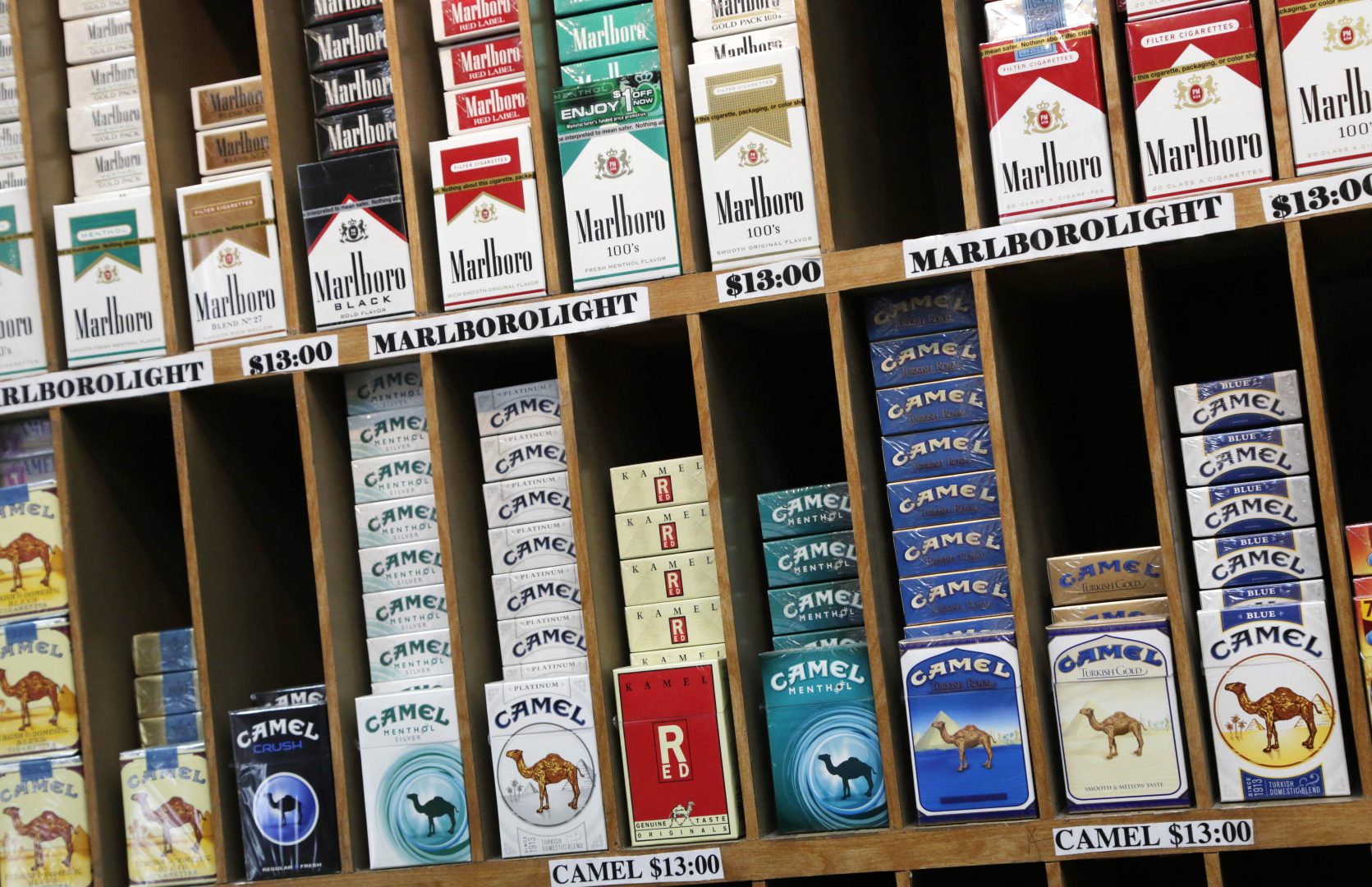 FILE PHOTO: 
Cigarette packs are displayed for sale at a convenience store in New York.