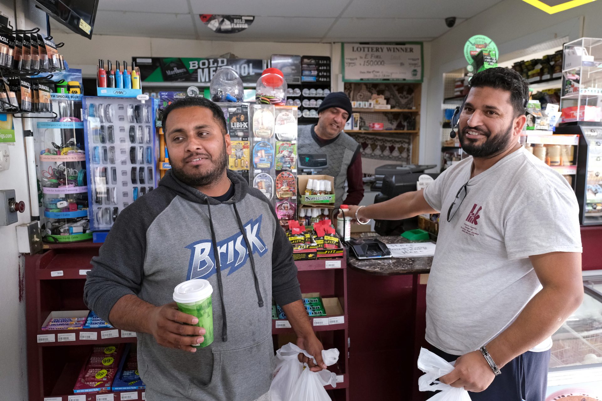 Sam Singh, left, of Michigan, and Arjan Singh, right, of New Jersey, buy food inside Eat Spice on Oct. 24, 2019, in the truck stop on route 534 off I-80 in White Haven, Pennsylvania. The restaurant caters to members of the Sikh community and as there is a large population of truckers from that community, the Indian Dhaba and Mediterranean dishes become hard to find on the road.