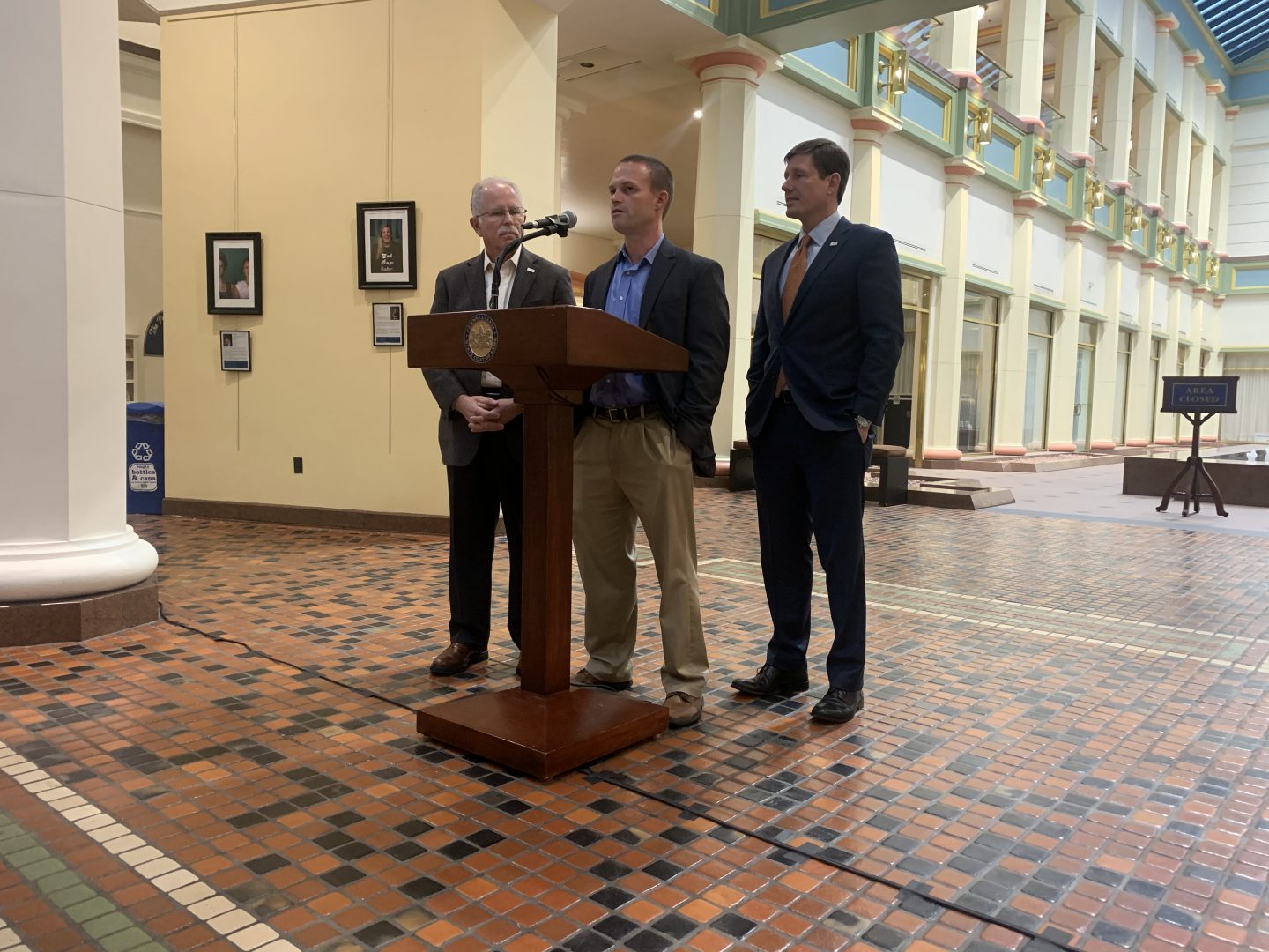 Lead plaintiff David Schaszberger speaks at a Capitol press conference, flanked by one of his attorneys and Mark Janus, the Illinois plaintiff at the heart of the Janus decision that stopped public sector unions from collecting dues from non-members. 