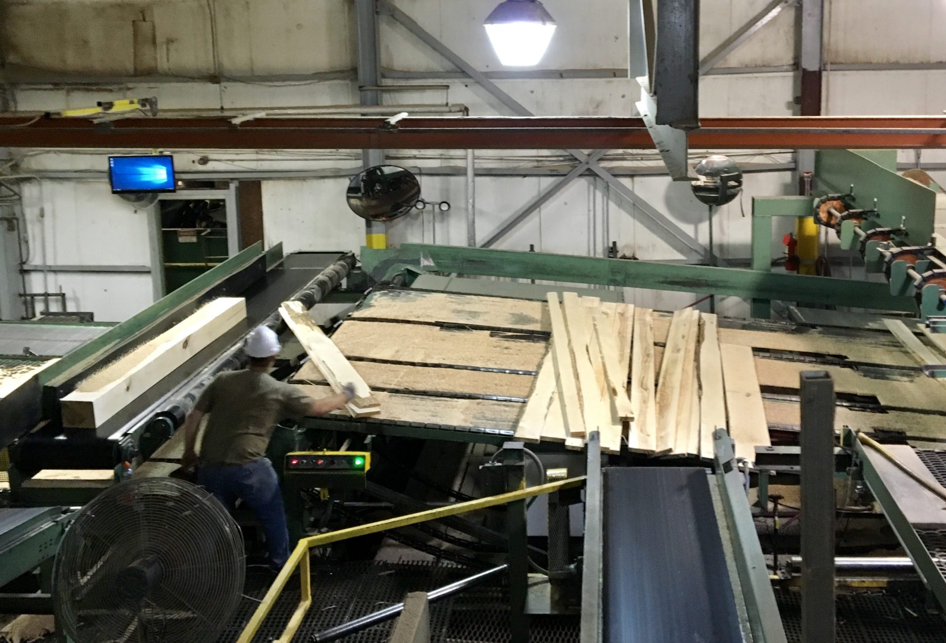 An employee at Collins Hardwood in Kane, Pennsylvania. The uncertainty of trade between China and the United States makes doing business in the hardwood industry more challenging.