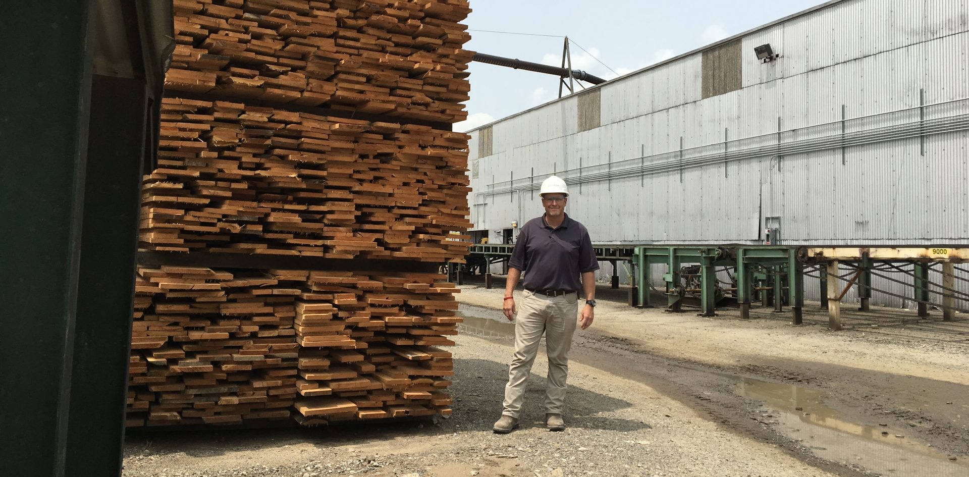 Bo Hammond is hardwood sales manager for Collins Hardwood, a company based in Oregon with locations in Pennsylvania, West Virginia and California. He and others in the industry say they're feeling the effects of the United States' trade war with China