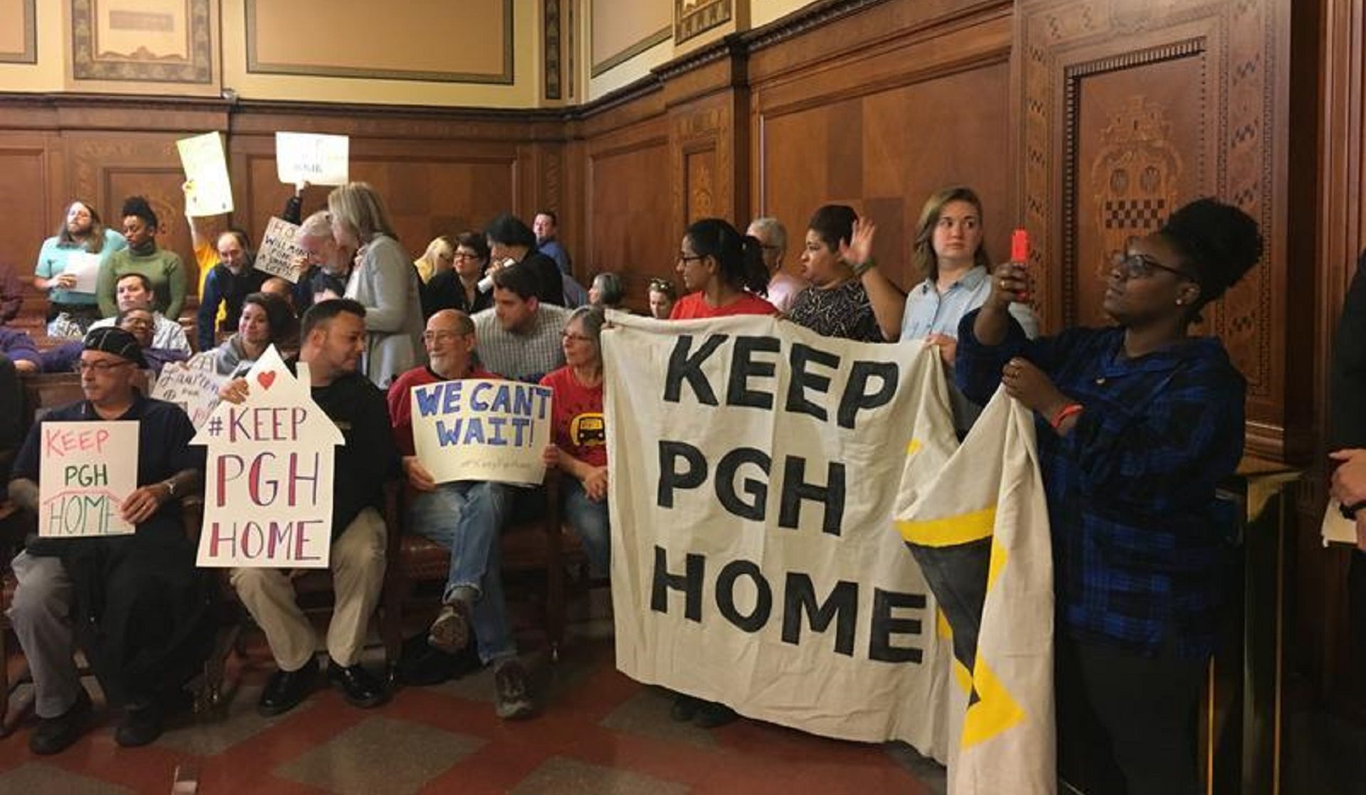 In this Dec. 2017 photo, activists urge Pittsburgh City Council to approve a funding source for the Housing Opportunity Fund.