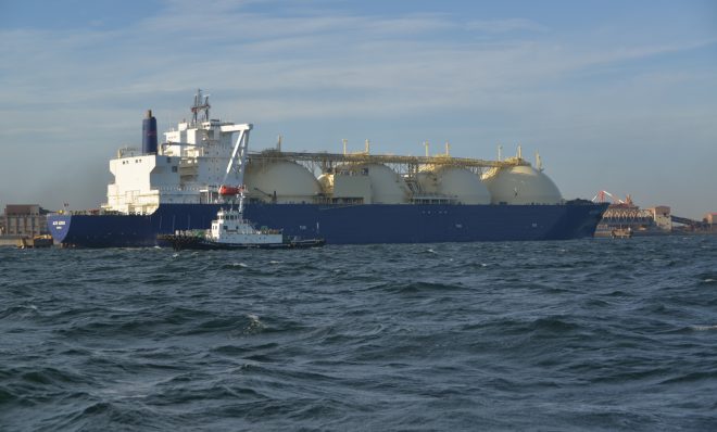 An LNG tanker in Tokyo Bay unloads its cargo at a regasification plant at the Port of Yokohama, Japan.