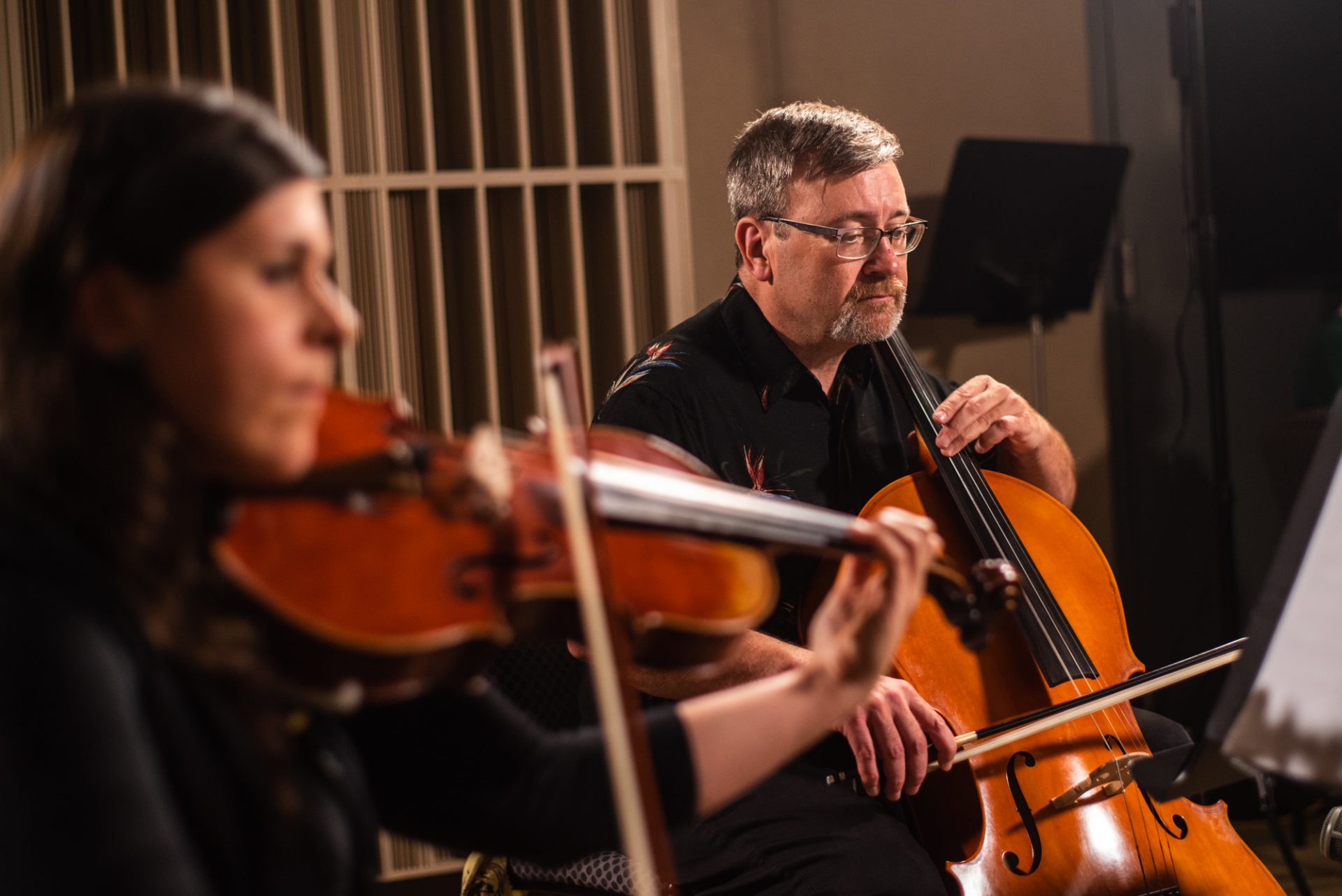 Cellist Matt Masek performing with Sempre Dolce