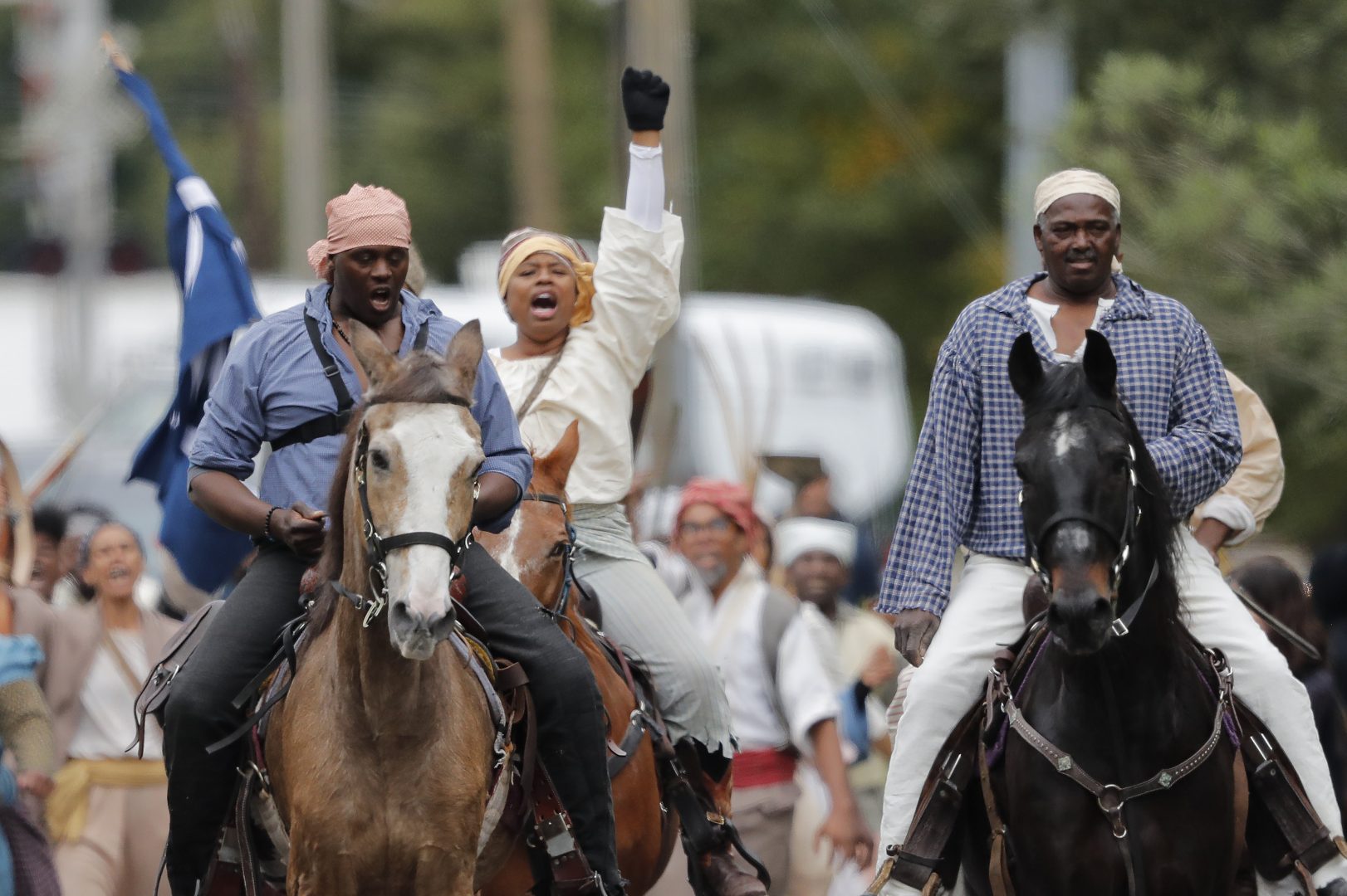 Volunteers participate in a reenactment of what is thought to be the largest slave rebellion in U.S. history in LaPlace, La., on Friday.