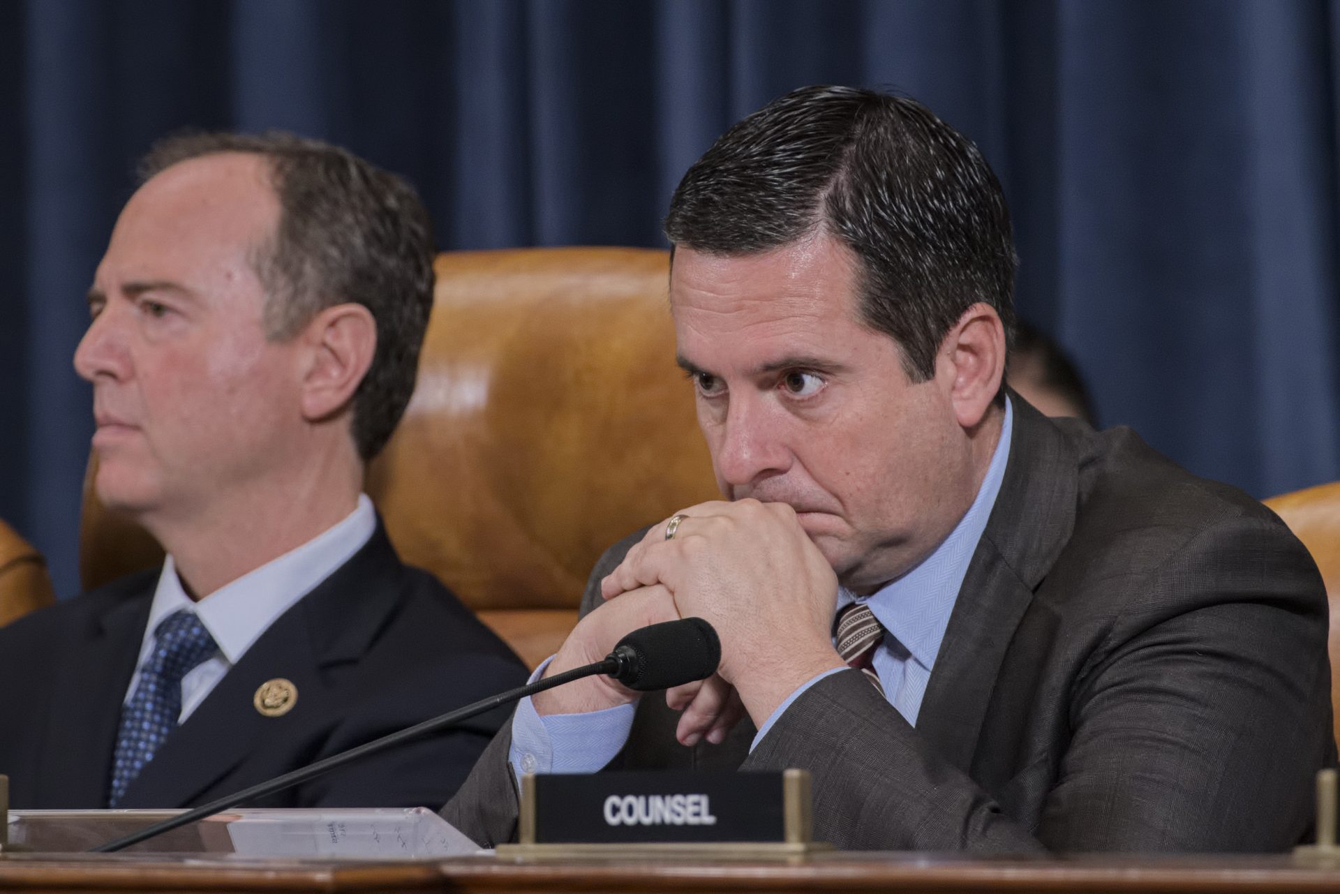 Rep. Devin Nunes, R-Calif, the ranking member of the House Intelligence Committee, joined at left by Chairman Adam Schiff, D-Calif., pauses at the conclusion of questioning of witnesses Jennifer Williams, an aide to Vice President Mike Pence, and National Security Council aide Lt. Col. Alexander Vindman, on Capitol Hill in Washington, Tuesday, Nov. 19, 2019, during a public impeachment hearing of President Donald Trump's efforts to tie U.S. aid for Ukraine to investigations of his political opponents.