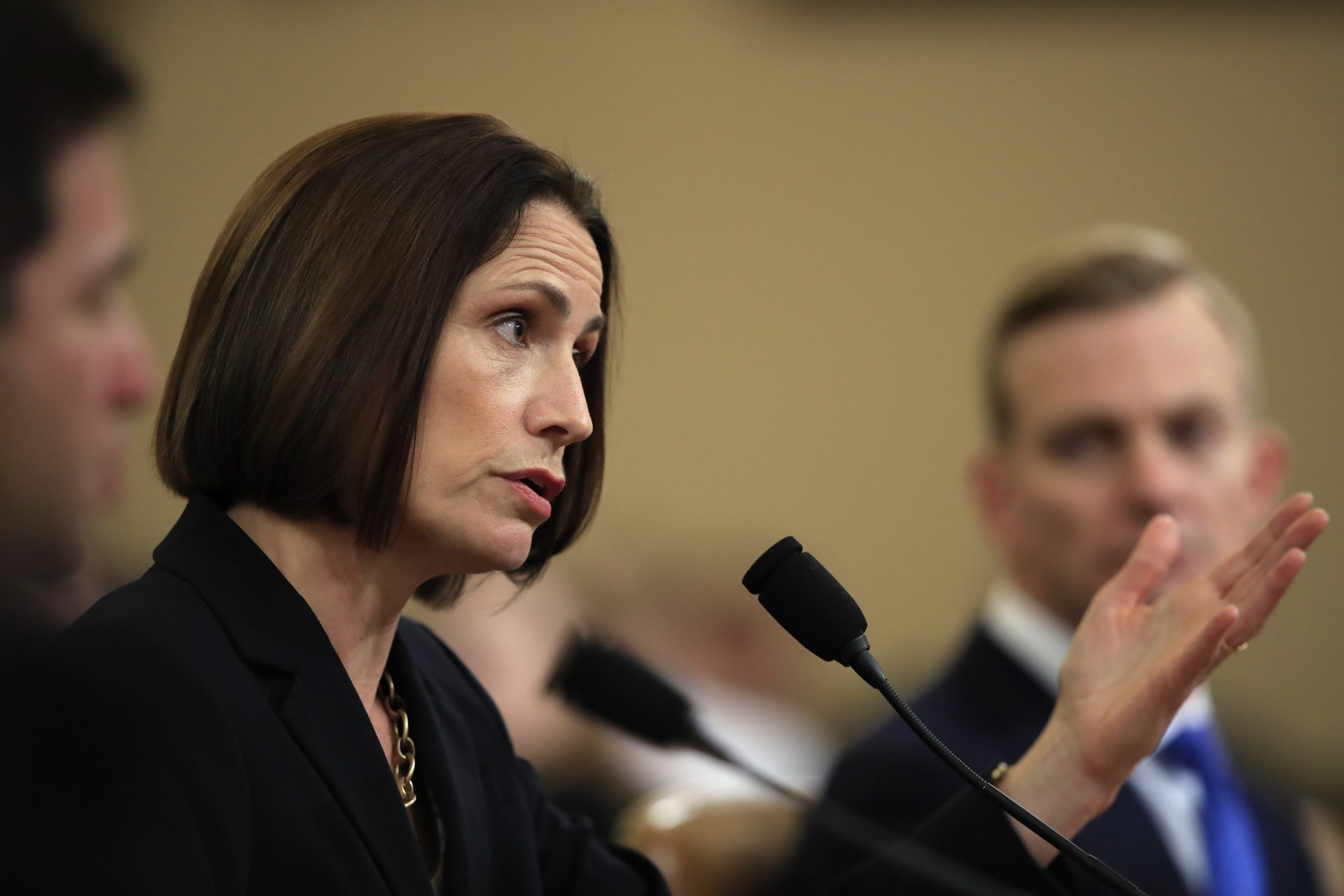 Former White House national security aide Fiona Hill, and David Holmes, a U.S. diplomat in Ukraine, right, testify before the House Intelligence Committee on Capitol Hill in Washington, Thursday, Nov. 21, 2019, during a public impeachment hearing of President Donald Trump's efforts to tie U.S. aid for Ukraine to investigations of his political opponents.