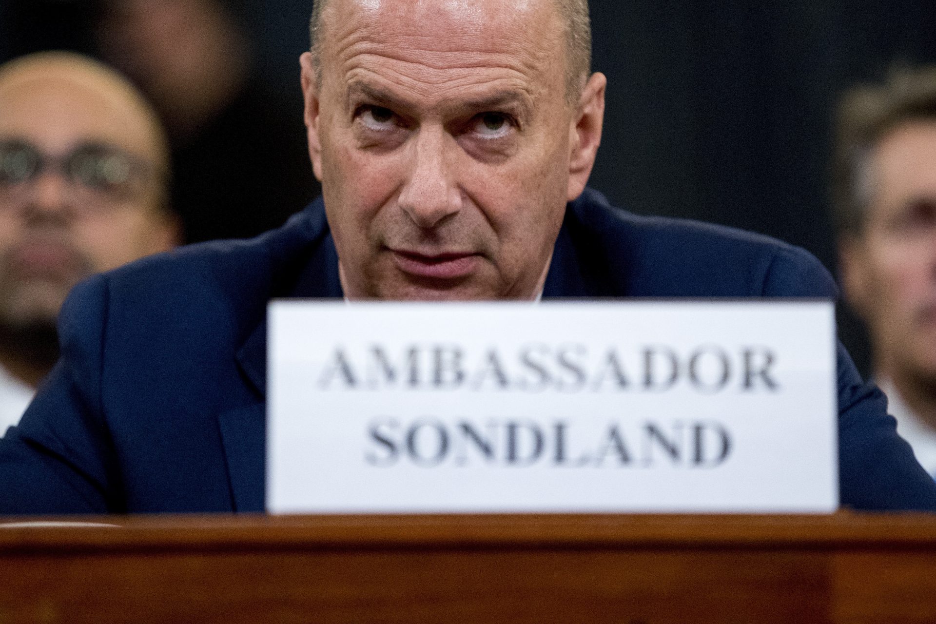 Ambassador Gordon Sondland, U.S. Ambassador to the European Union, center, appears before the House Intelligence Committee on Capitol Hill in Washington, Wednesday, Nov. 20, 2019, during a public impeachment hearing of President Donald Trump's efforts to tie U.S. aid for Ukraine to investigations of his political opponents.