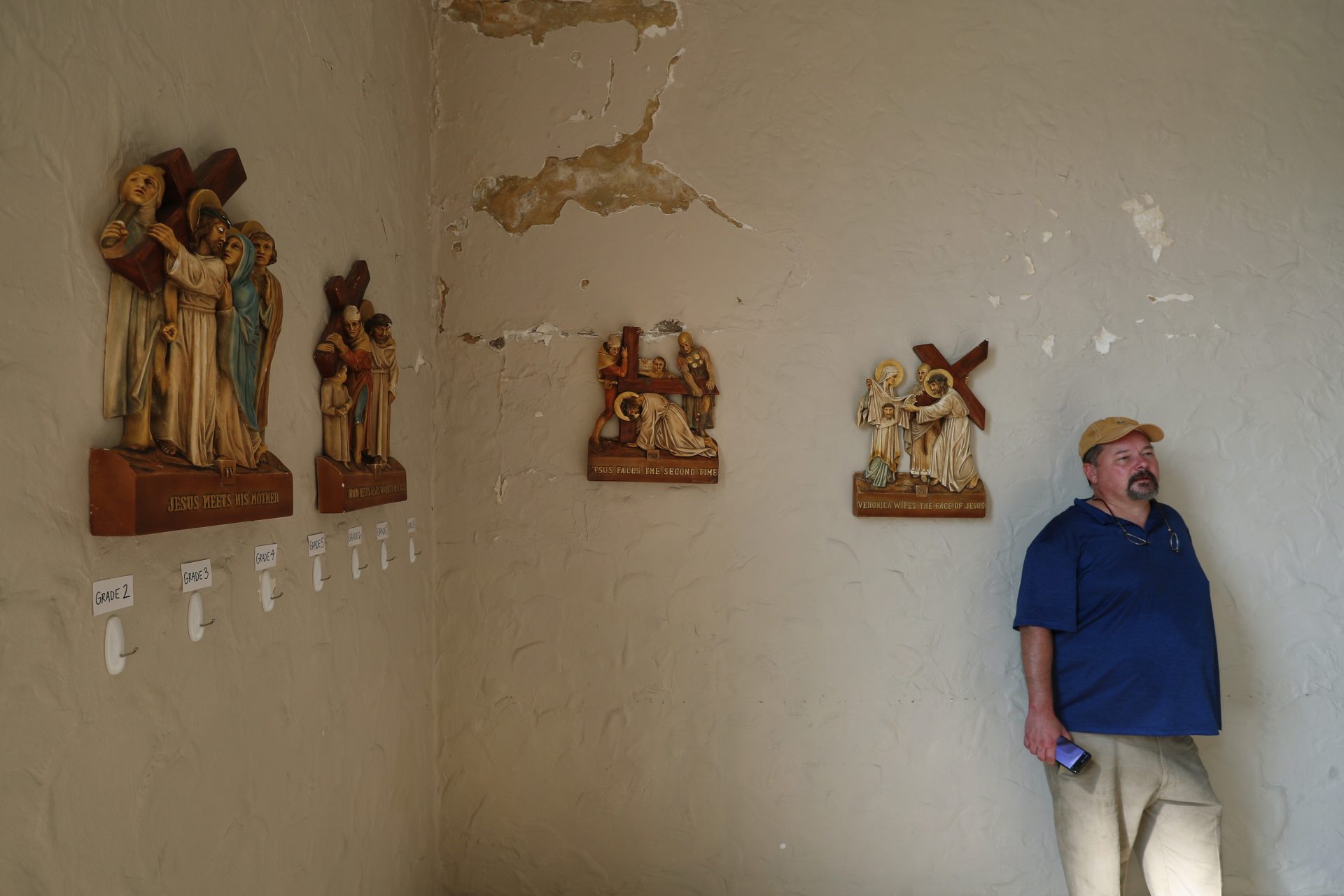 Riley Kinn visits the chapel at St. Wendelin Catholic High School in Fostoria, Ohio, Wednesday, Sept. 11, 2019. Kinn was abused by a priest at the high school and although assured by the Diocese of Toledo, Ohio, that he'd have the chance to share his story with a review board, was never given the opportunity to. Toledo Diocese spokeswoman Kelly Donaghy said the review board doesn’t promise victims they can testify, but examines each case in turn.