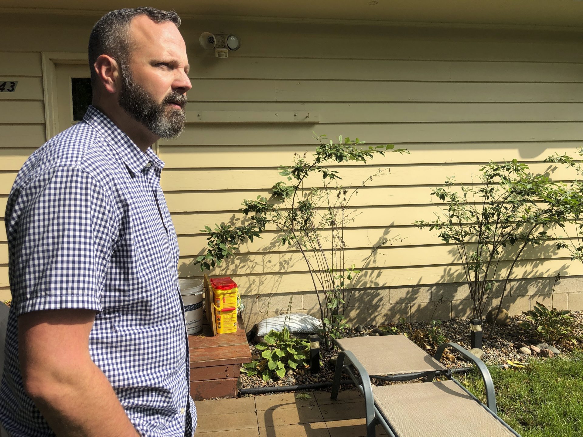 Dr. Jim Richter, a survivor of sexual abuse by a priest who is a member of the review board in the Archdiocese of St. Paul and Minneapolis, walks outside his home in Minneapolis, on Sept. 21, 2019. Richter praises the work of the review board he serves on, but says others are full of "unqualified, well-meaning, but ultimately incompetent" members.