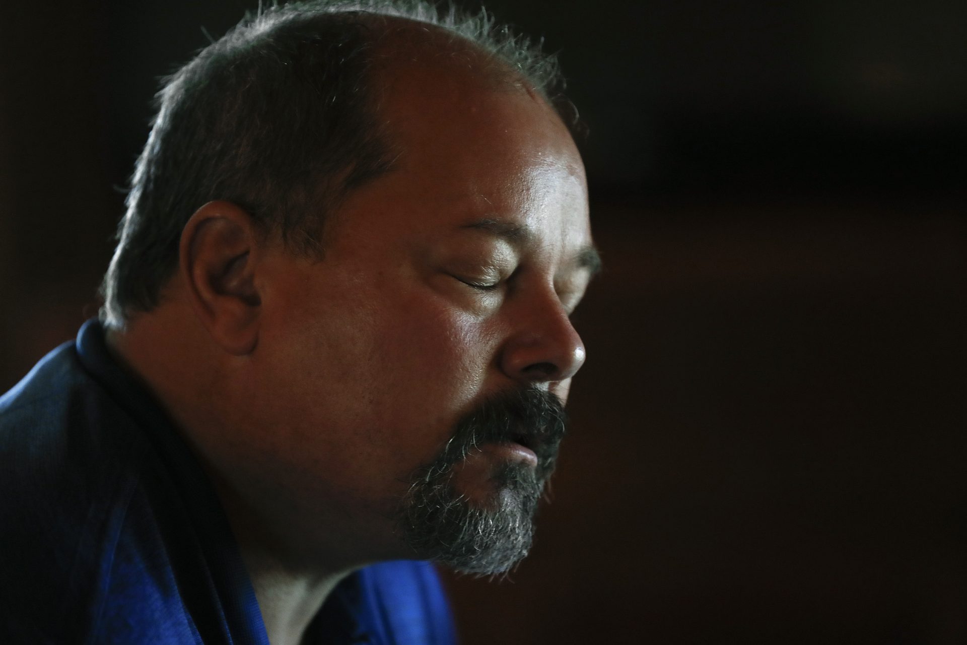 Riley Kinn reacts during an interview in Fostoria, Ohio, on Wednesday, Sept. 11, 2019. Kinn was abused by a priest at his Ohio high school and although assured by the Diocese of Toledo, Ohio, that he'd have the chance to share his story with a review board, was never given the opportunity to. Toledo Diocese spokeswoman Kelly Donaghy said the review board doesn’t promise victims they can testify, but examines each case in turn.