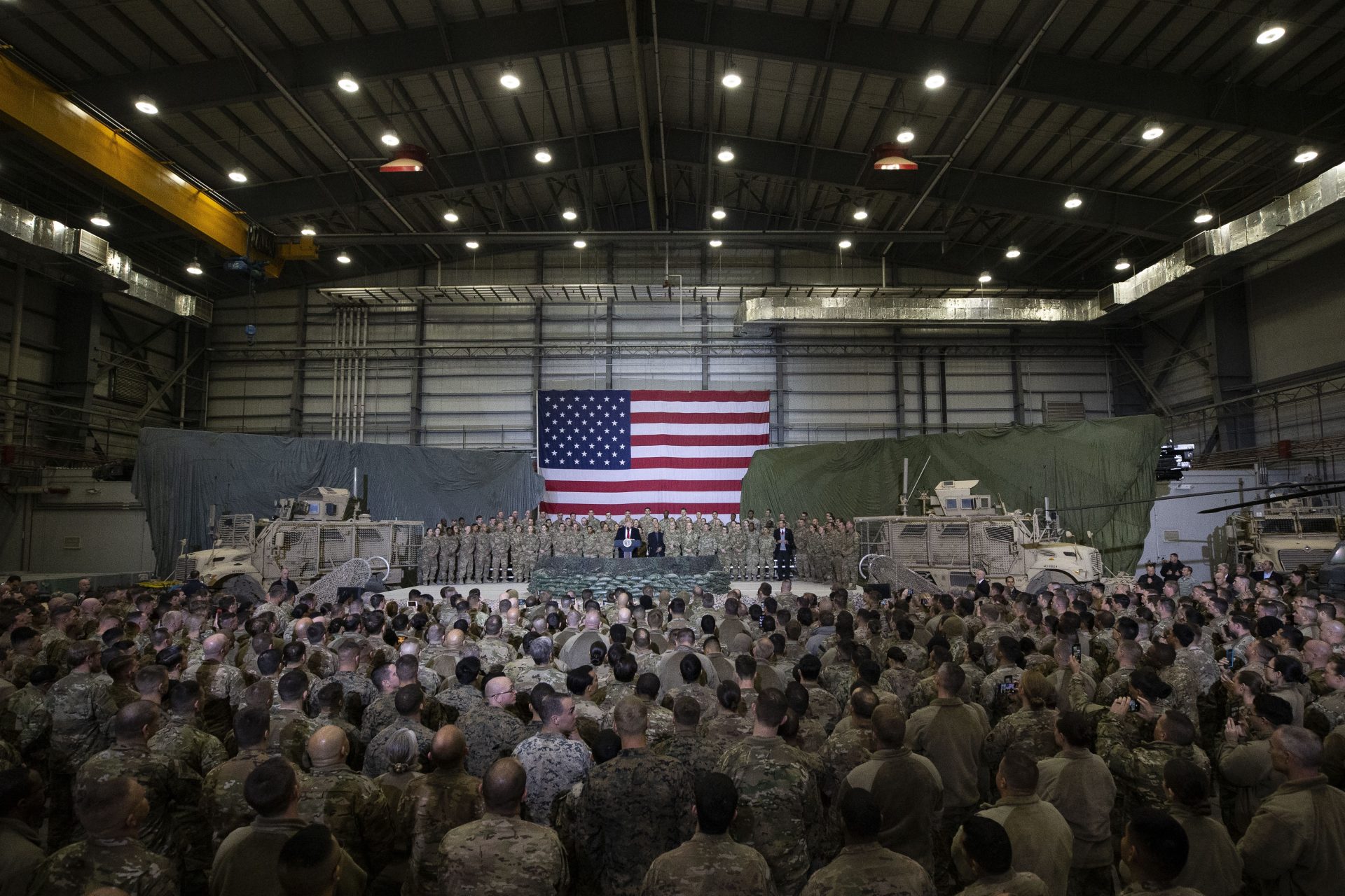 President Donald Trump addresses members of the military during a surprise Thanksgiving Day visit, Thursday, Nov. 28, 2019, at Bagram Air Field, Afghanistan.