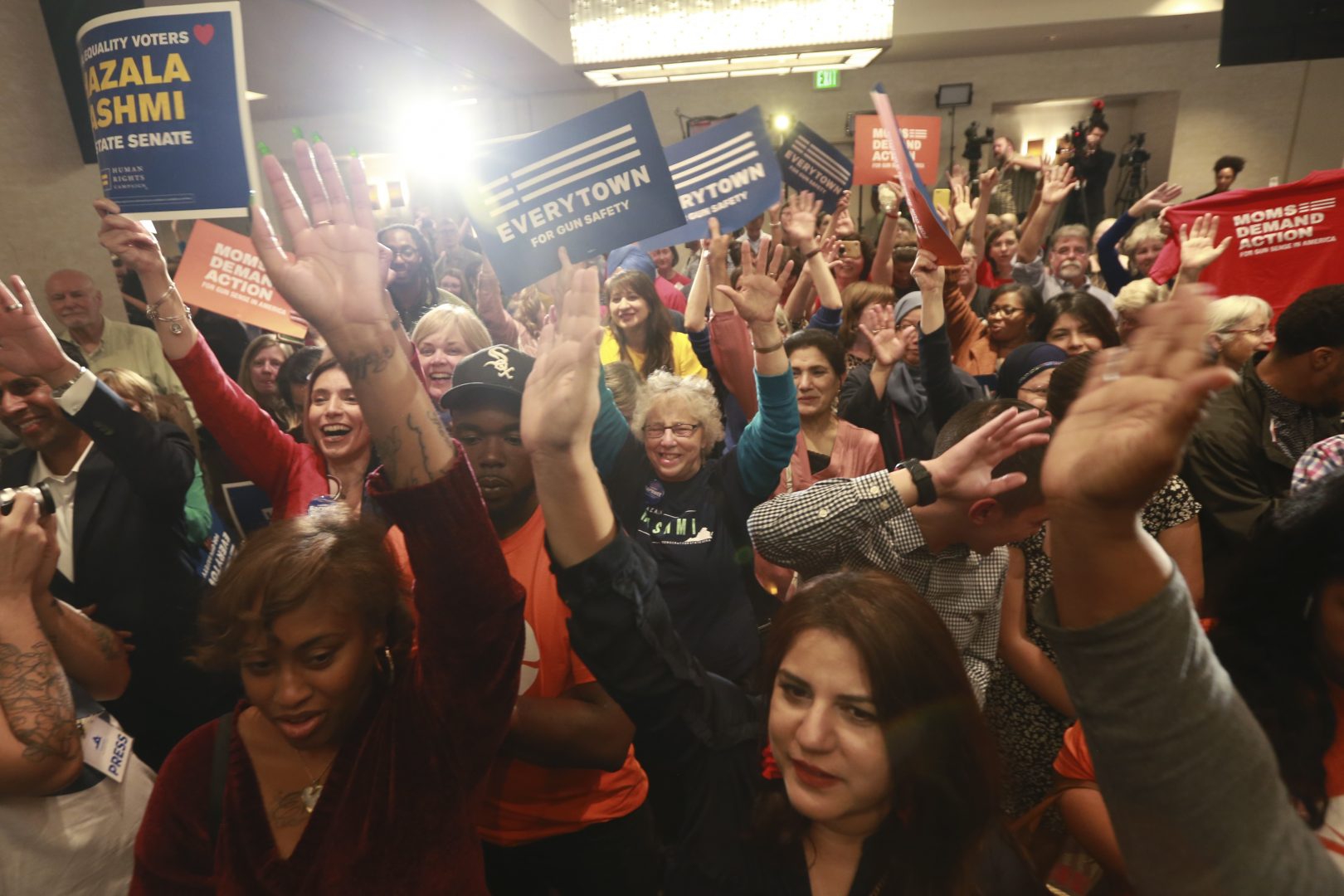 Democratic supporters cheer their candidates at a Democratic Party event in Richmond, Va., Tuesday, Nov. 5, 2019. All seats in the Virginia House of Delegates and state Senate are up for election. 