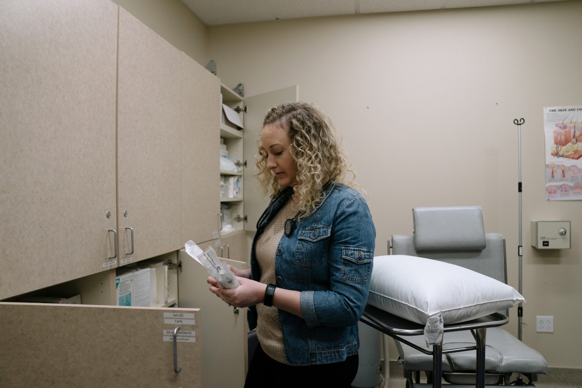 Katie Buckman, a third-year medical student at Pacific Northwest University of Health Sciences, gathers supplies for her volunteer work at the Yakima Union Gospel Mission's medical clinic.