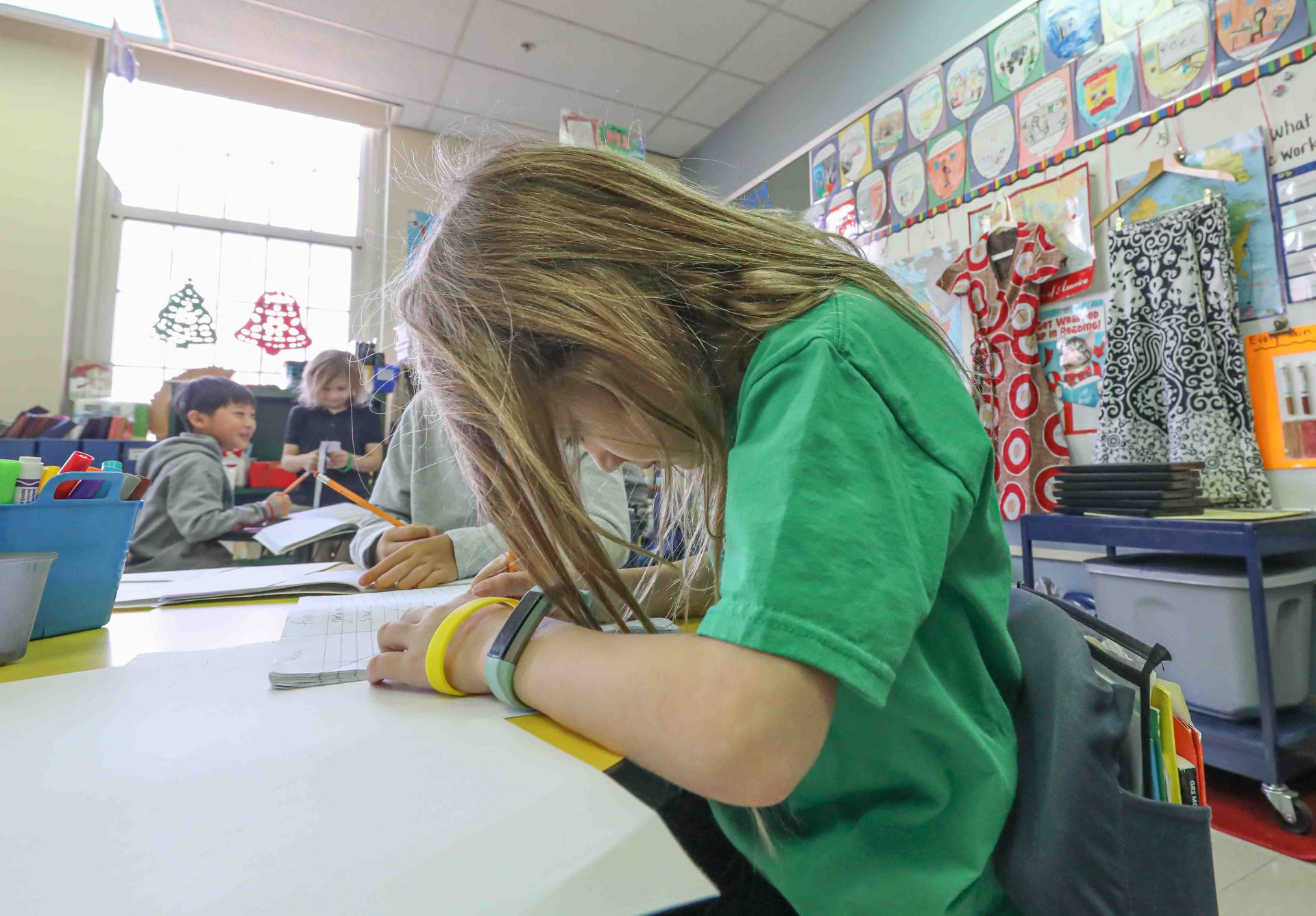 Student Avery Guaveia (7) designs her family tree during a global awareness session Thursday, Dec. 12, 2019, at Mount Pleasant Elementary School in Wilmington, DE.