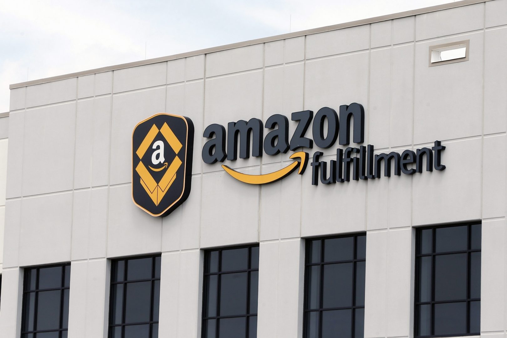 FILE - This Monday, July 8, 2019 file photo shows the Amazon Fulfillment warehouse in Shakopee, Minn. Amazon is on the hunt for workers. The online shopping giant is looking to fill more than 30,000 vacant jobs by early next year, and is holding job fairs across the country next week to find candidates. The job fairs will take place Sept. 17, 2019 in six U.S. cities: Arlington, Virginia; Boston; Chicago; Dallas, Texas; Nashville, Tennessee; and Seattle. 