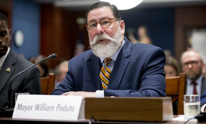 Pittsburgh Mayor Bill Peduto speaks at a Senate Democrats' Special Committee on the Climate Crisis on Capitol Hill in Washington, Wednesday, July 17, 2019. Former New York City mayor Michael Bloomberg is courting Peduto's endorsement in the Democratic presidential primary. (AP Photo/Andrew Harnik)