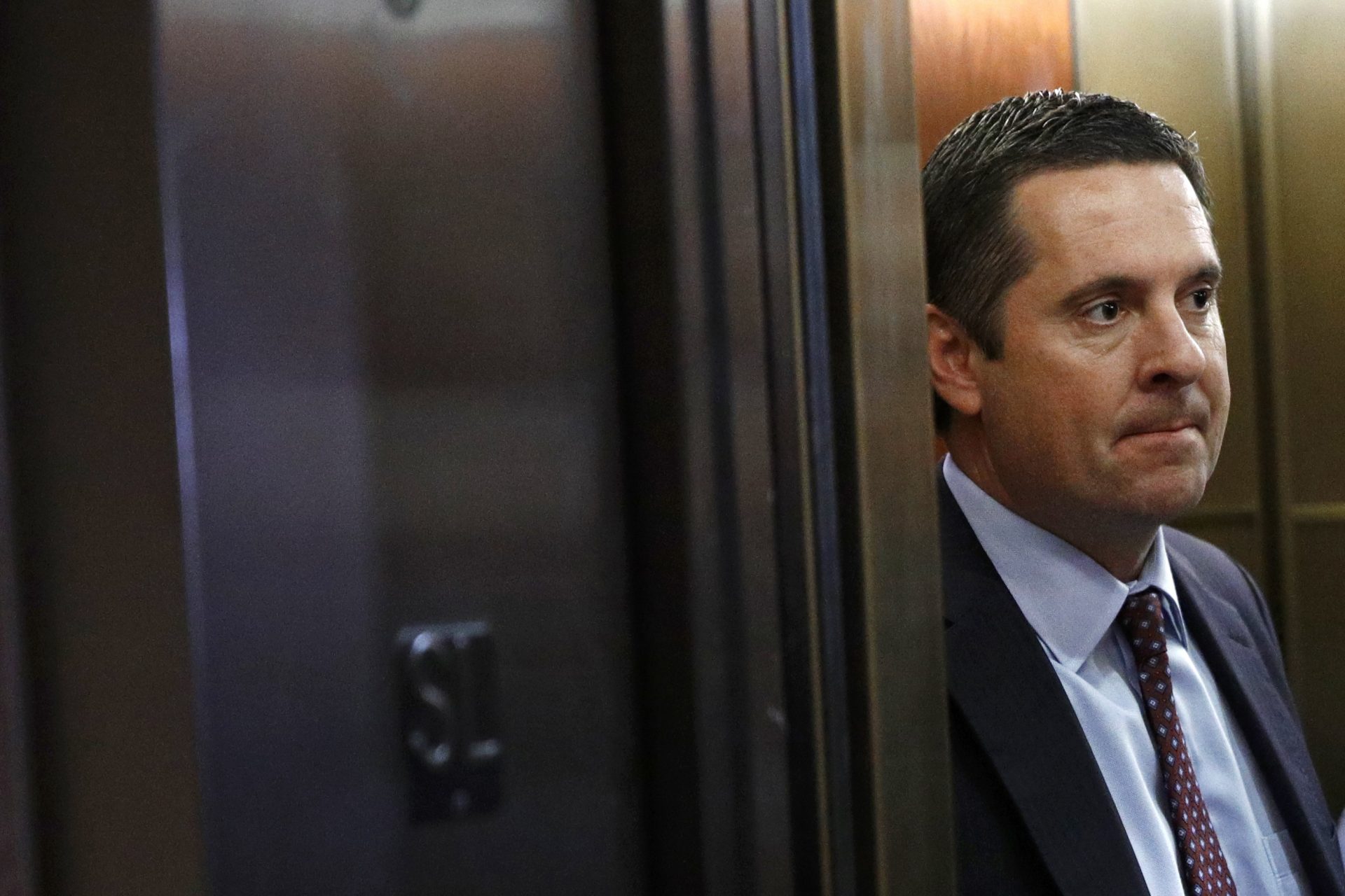 Rep. Devin Nunes, R-Calif., stands in an elevator after departing a secure area of the Capitol in Washington, Tuesday, Dec. 3, 2019. The Democrats on the House Intelligence Committee have released a sweeping impeachment report outlining evidence of what it calls President Donald Trump's wrongdoing toward Ukraine.