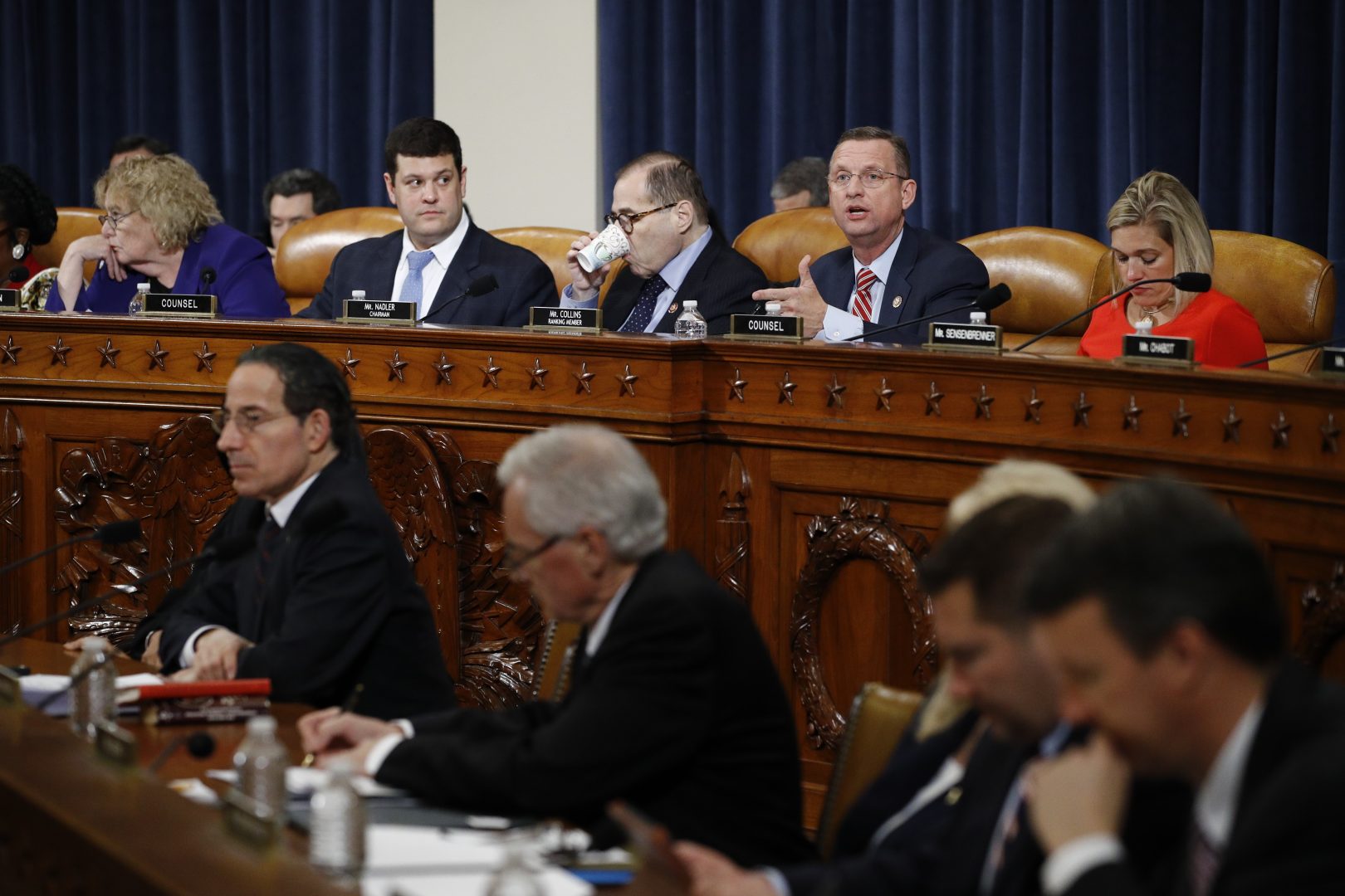 House Judiciary Committee ranking member Rep. Doug Collins, R-Ga., right, gives his opening statement during a House Judiciary Committee markup of the articles of impeachment against President Donald Trump, Wednesday, Dec. 11, 2019, on Capitol Hill in Washington. House Judiciary Committee Chairman Rep. Jerrold Nadler, D-N.Y., is left. 