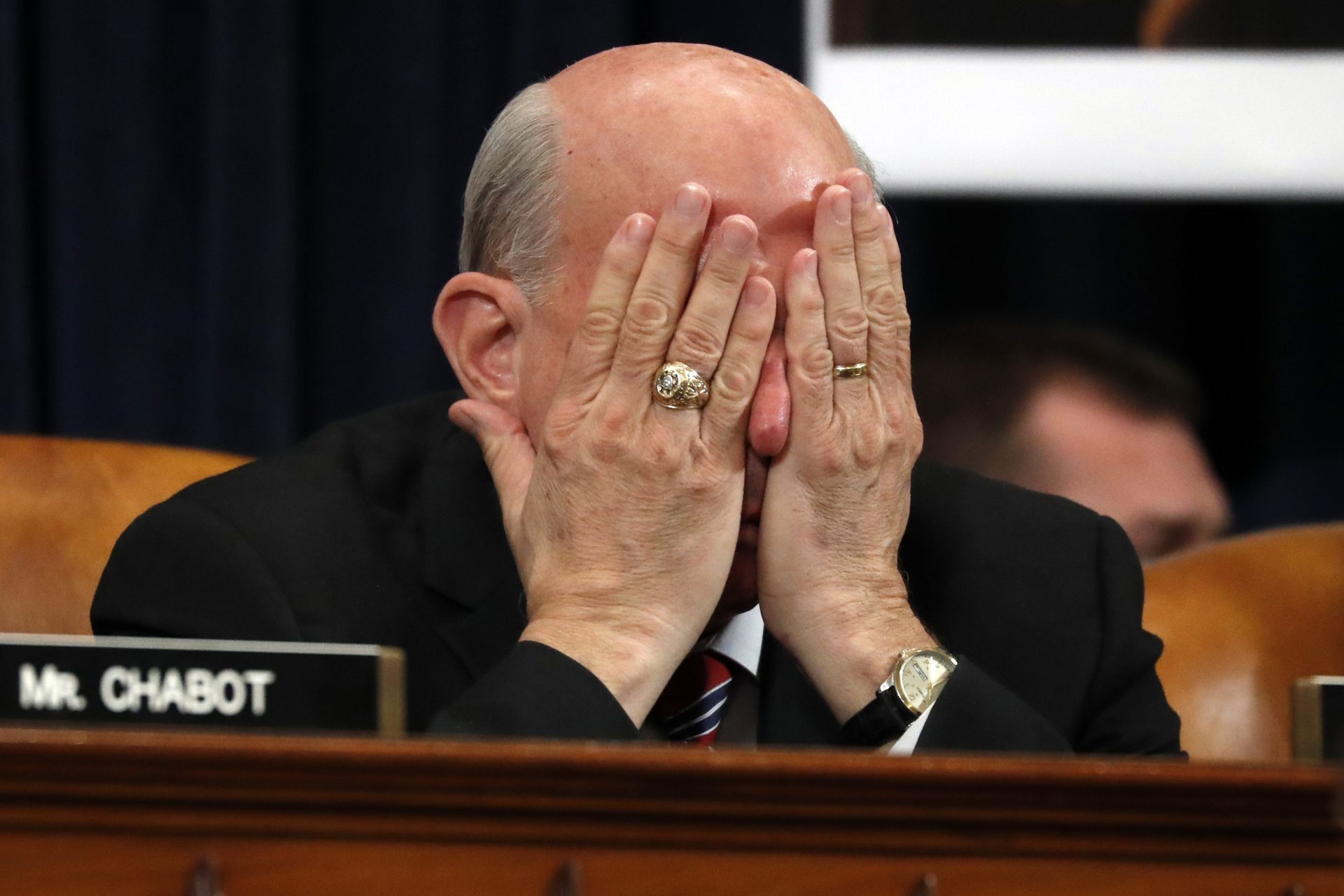 Rep. Louie Gohmert, R-Texas, rubs his face during a House Judiciary Committee markup of the articles of impeachment against President Donald Trump, Wednesday, Dec. 11, 2019, on Capitol Hill in Washington.