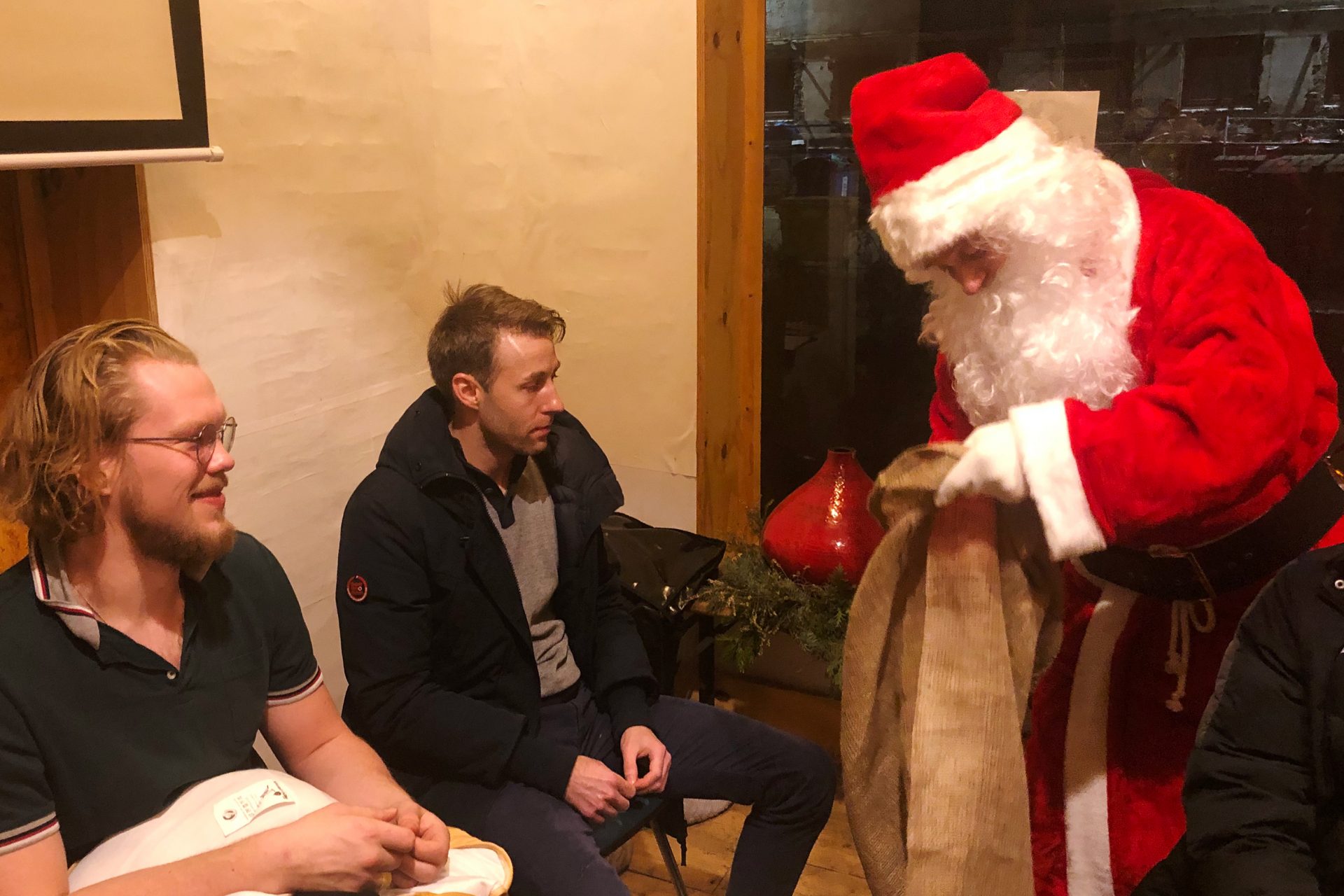 An applicant performs in a test-run as Santa at a workspace rented by Tholey's agency in Berlin, Germany.