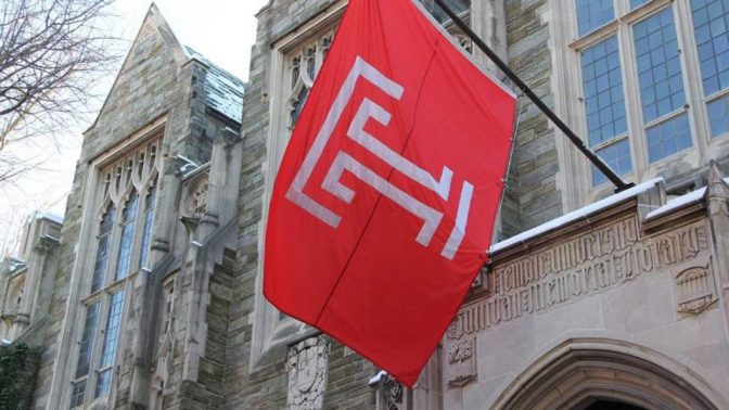 A flag hangs on campus at Temple University.