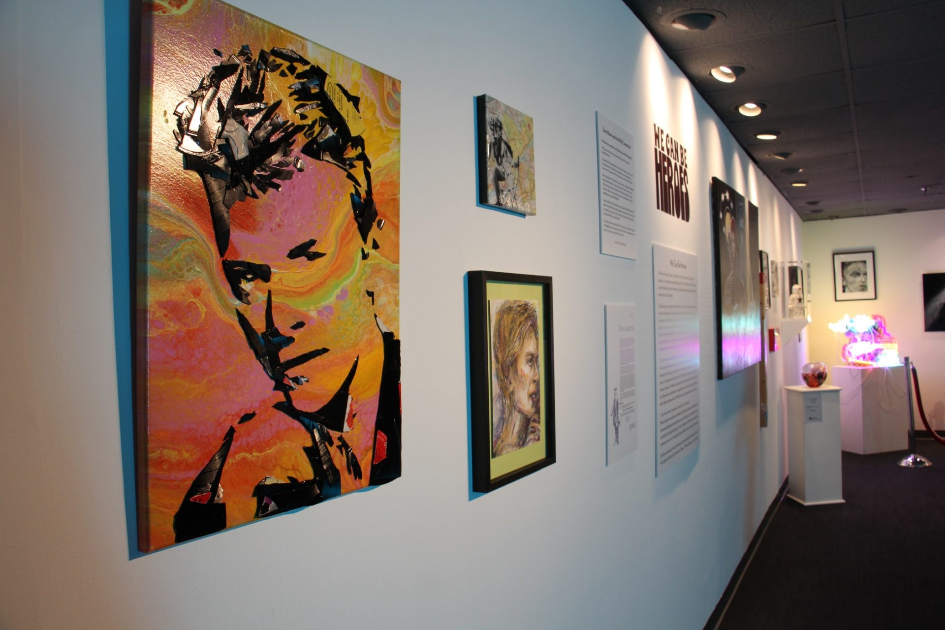 Bernard DelaCruz's 'Bowie On Vinyl,' hangs at the entrance to the We Can Be Heroes exhibit at the Liberty Museum.  The mixed media piece uses paint and fragments of vinyl records.