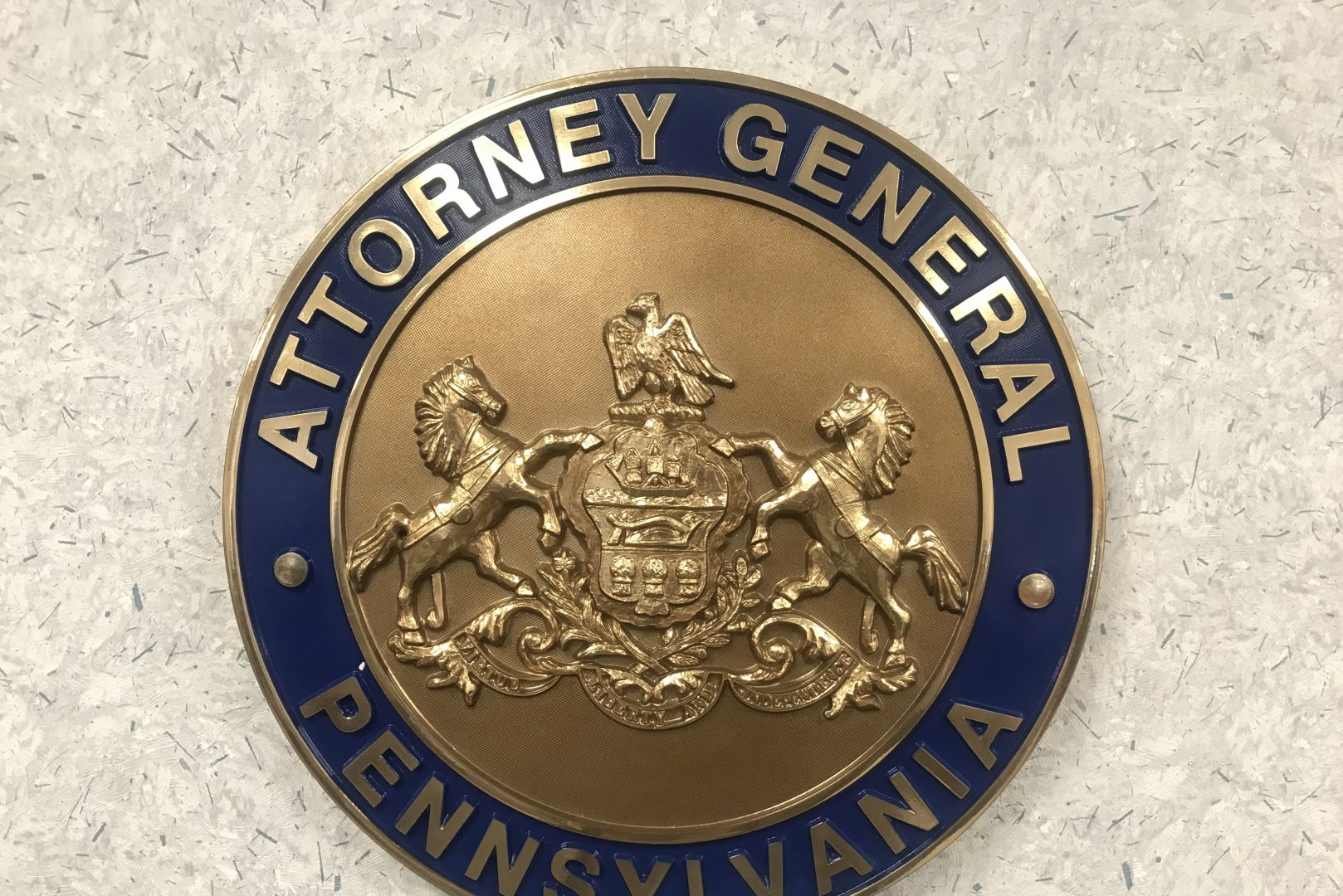 The Pa. attorney general's office seal is posted at the Safe2Say Something crisis center Jan. 13, 2020.