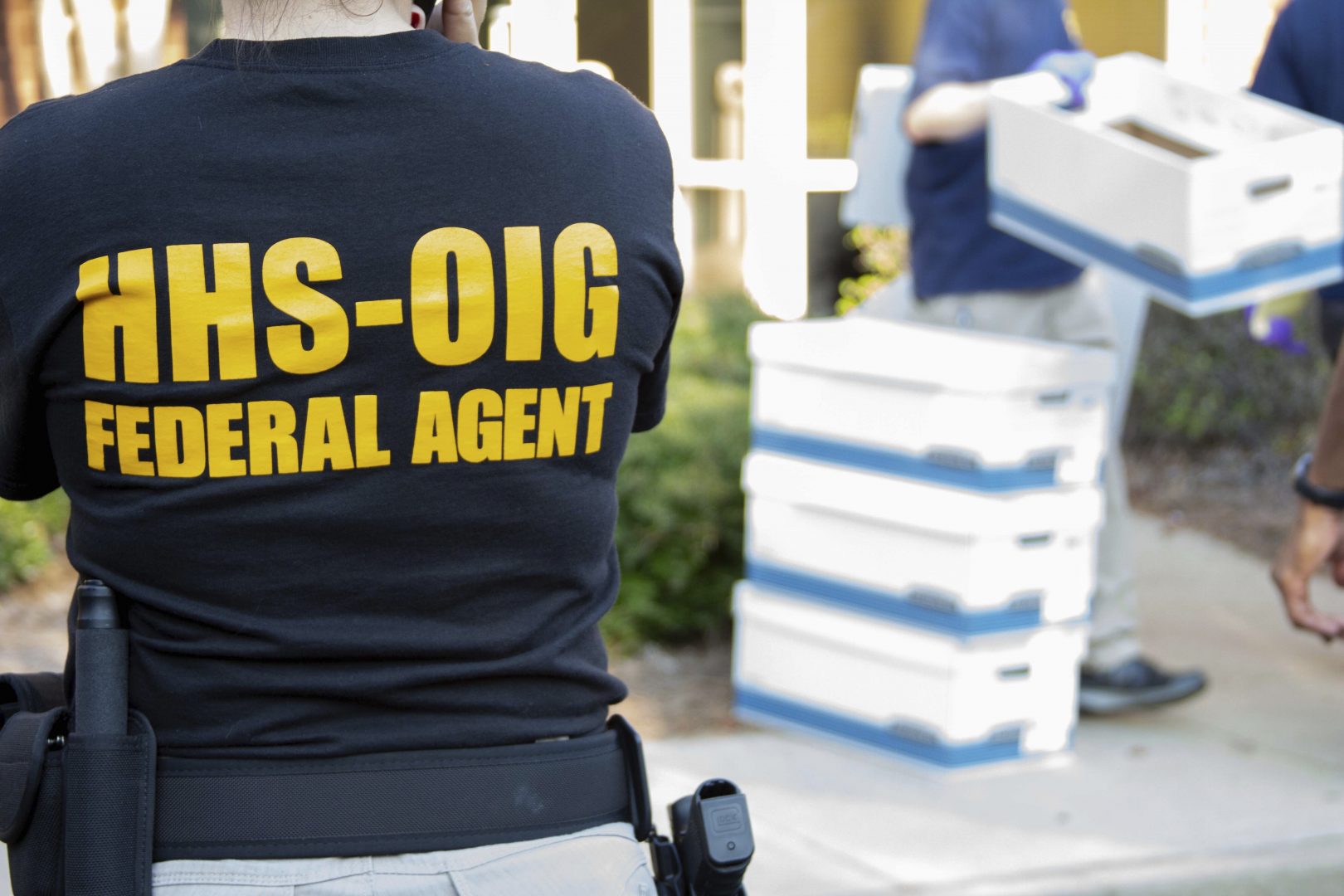 FILE PHOTO: In this photo provided by the Department of Health and Human Services Office of the Inspector General, federal agents from the HHS Office of Inspector General prepare for operations in the Atlanta region Friday, Sept. 27, 2019.