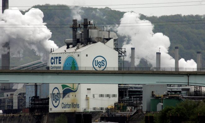 FILE PHOTO: In this May 1, 2008 file photo, steam pours from the US Steel Clairton Coke works in Clairton, Pa.