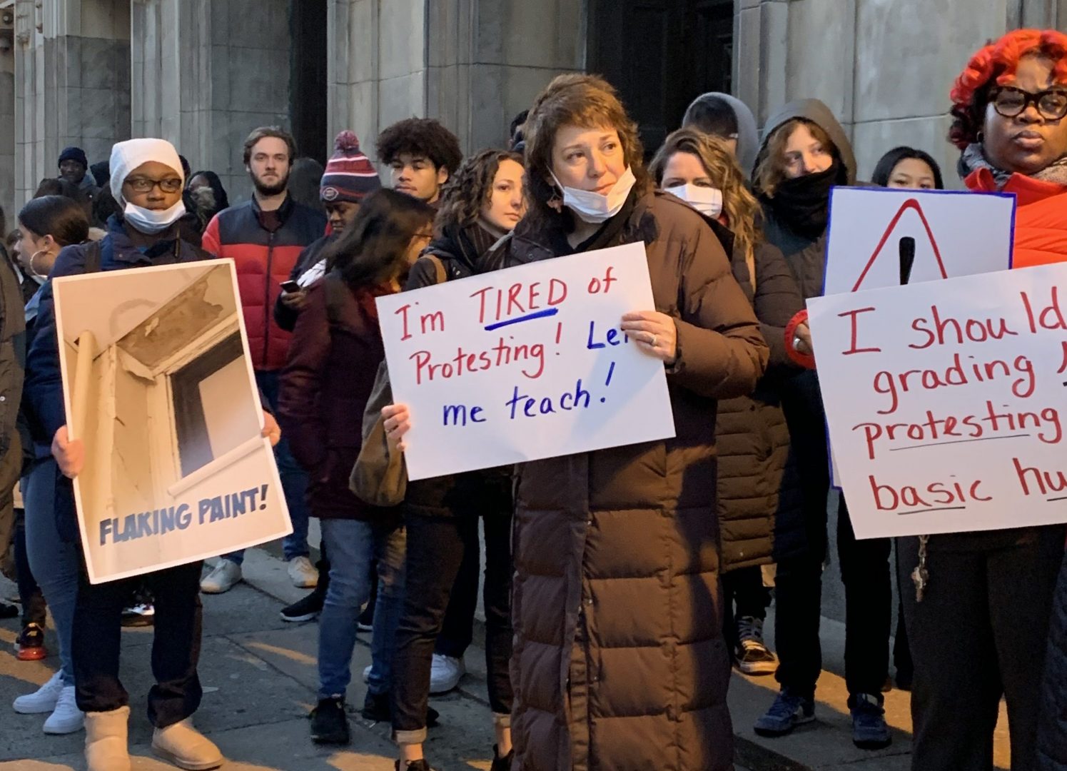 Teachers at Franklin Learning Center rally outside the school early Thursday morning demanding more action to make the building free of environmental hazards.