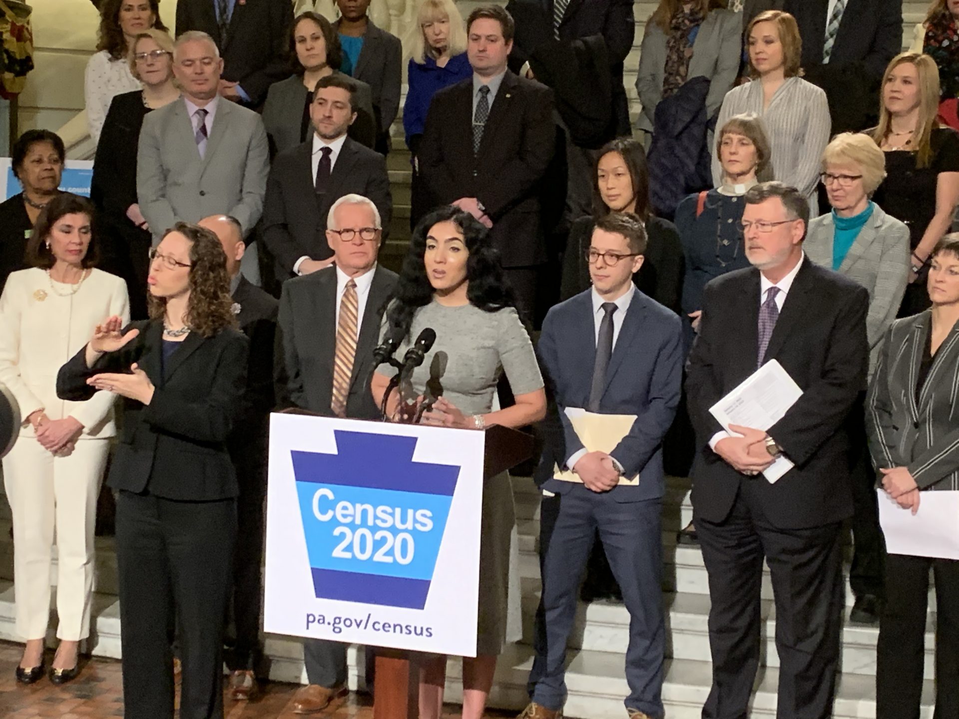 Pennsylvania's second lady Gisele Fetterman (at podium) announces at a Capitol news conference her upcoming statewide tour to try to get hard-to-reach populations to participate in the 2020 U.S. census.