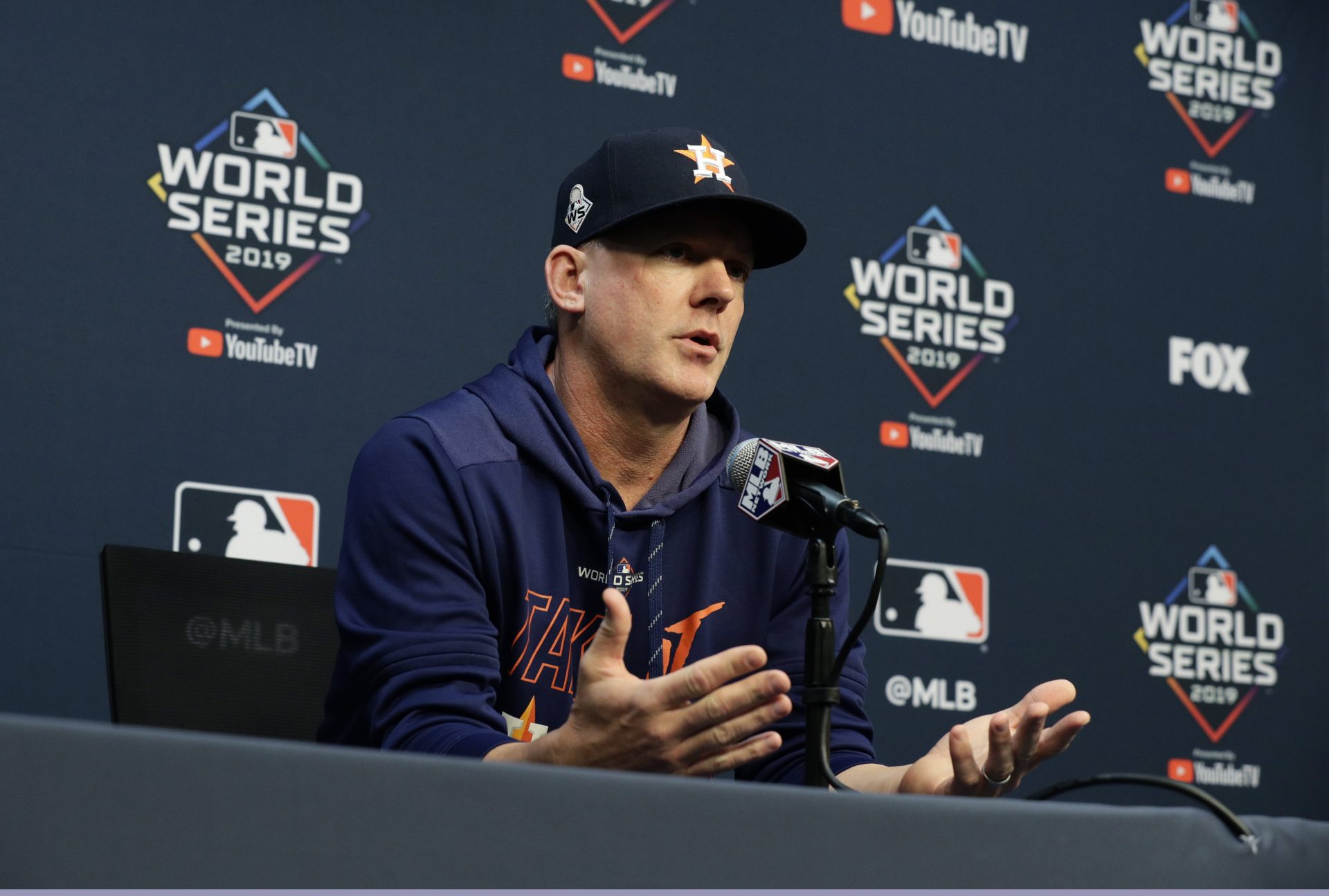 FILE - In this Oct. 28, 2019, file photo, Houston Astros manager AJ Hinch talks to the media during a news conference for baseball's World Series, in Houston. Houston manager AJ Hinch and general manager Jeff Luhnow were suspended for the entire season Monday, Jan. 13, 2020, and the team was fined $5 million for sign-stealing by the team in 2017 and 2018 season. Commissioner Rob Manfred announced the discipline and strongly hinted that current Boston manager Alex Cora — the Astros bench coach in 2017 — will face punishment later. Manfred said Cora developed the sign-stealing system used by the Astros.