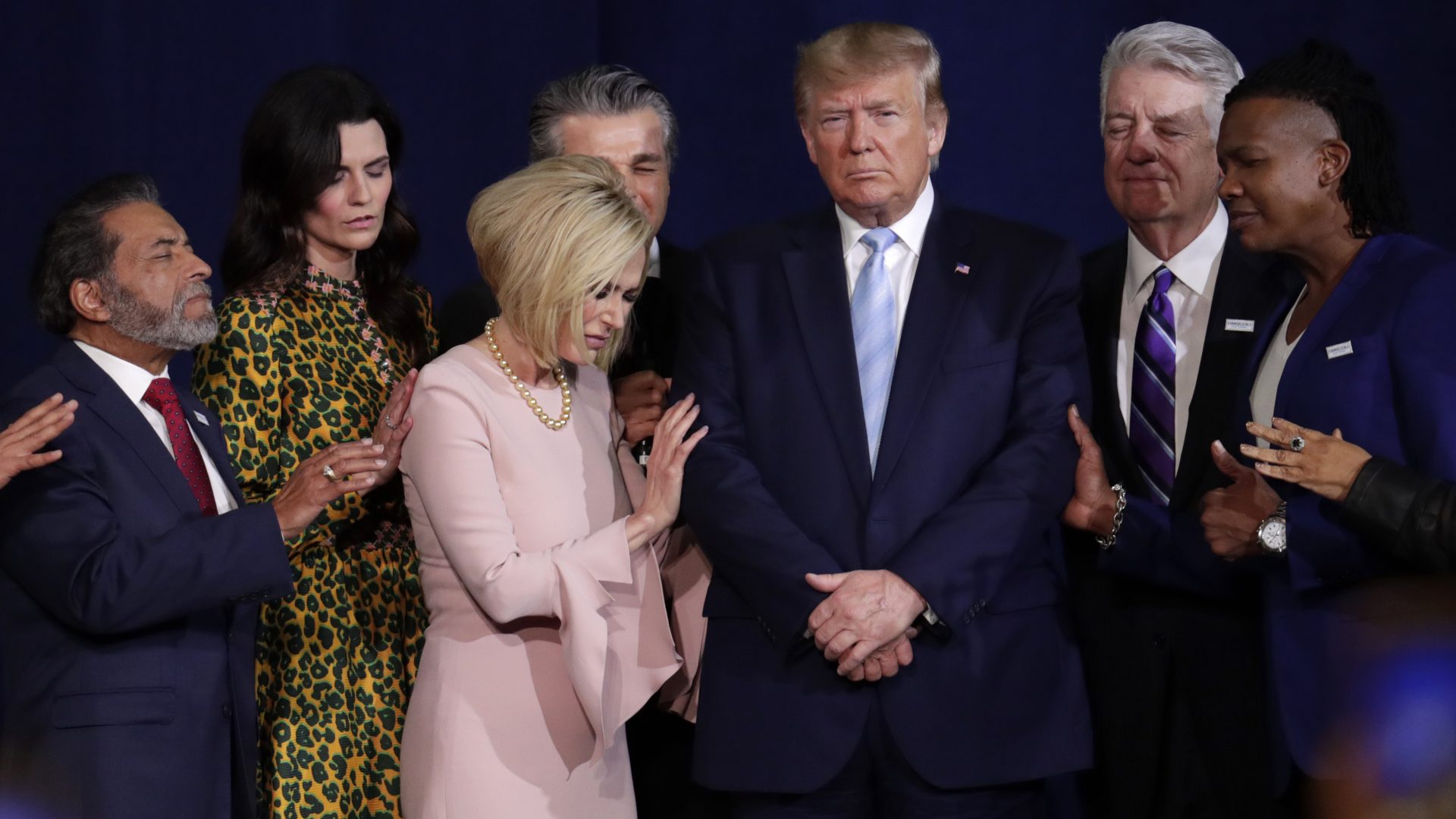 Faith leaders pray with President Trump during a rally for evangelical supporters at the King Jesus International Ministry church in Miami earlier this month.