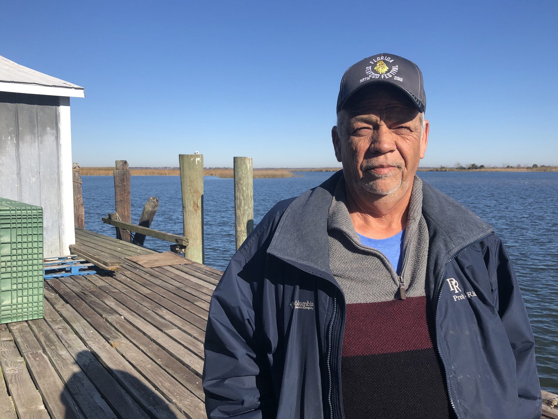 Joseph "Smokey" Parrish has worked at 13 Mile Seafood for 37 years. He oversees the wholesale shrimp operation and is also a Franklin County commissioner. He says nearly 5,000 jobs are at stake if the fisheries here collapse.