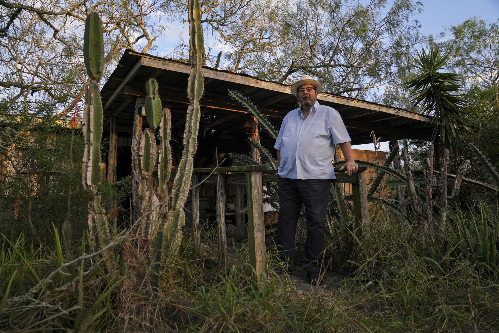 Tony Zavaleta stands at his historic ranch east of Brownsville, Texas, where he says a wildlife refuge next door has helped the deer population. He's even spotted a cougar.